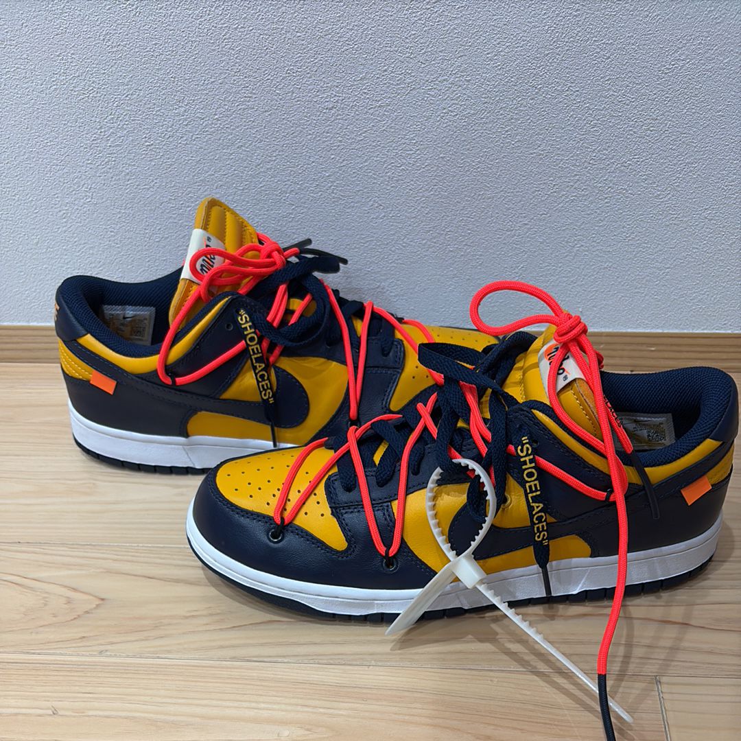 Off-White × Nike Dunk Low LTHR "University Gold/Midnight Navy/White"