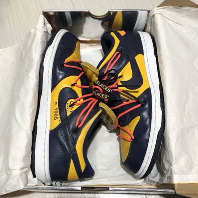 Off-White × Nike Dunk Low LTHR "University Gold/Midnight Navy/White"