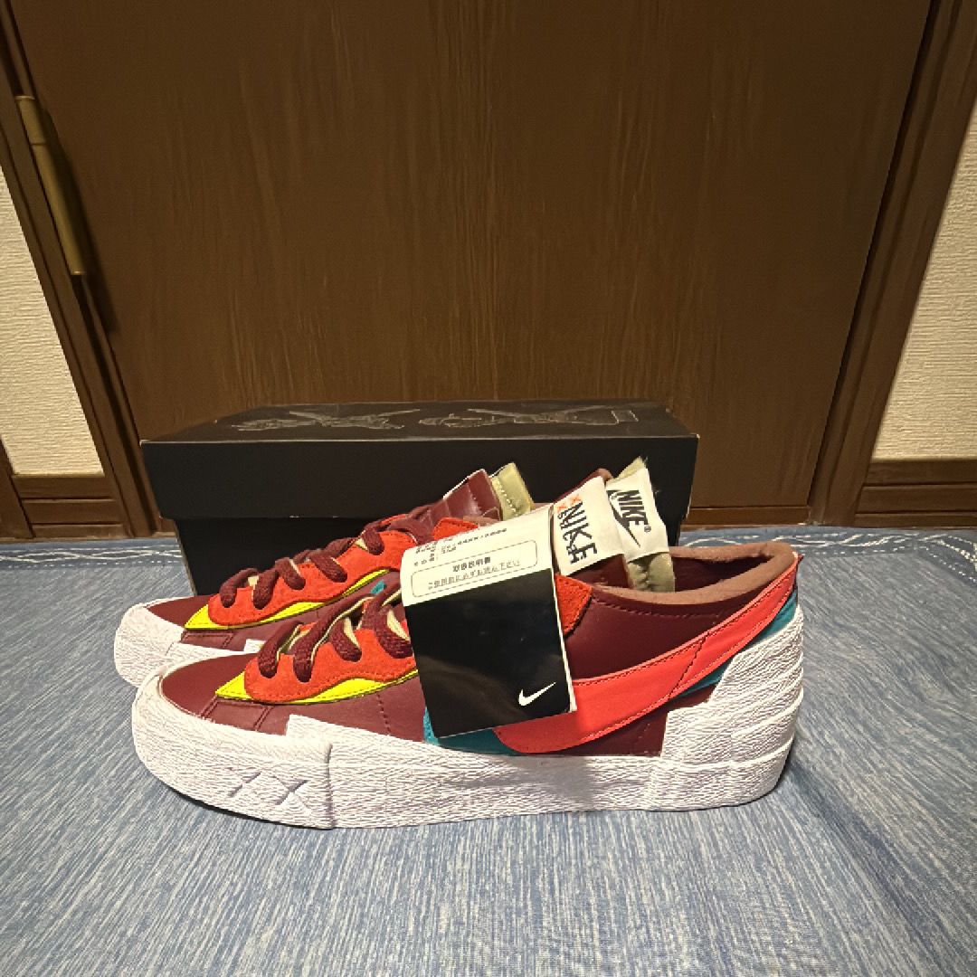 KAWS × sacai × Nike Blazer Low "Team Red"