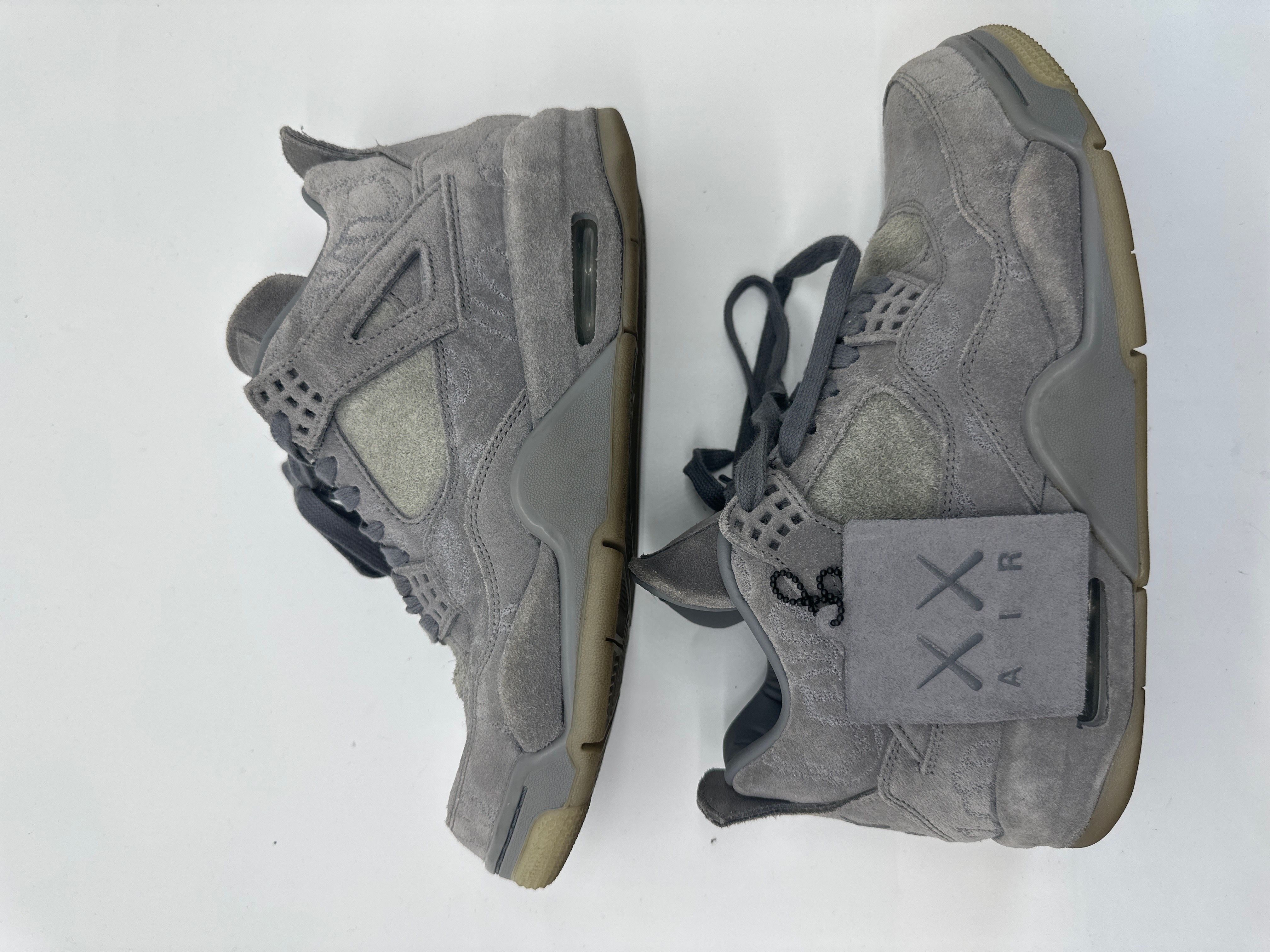 KAWS × Nike Air Jordan 4 Retro "Grey"