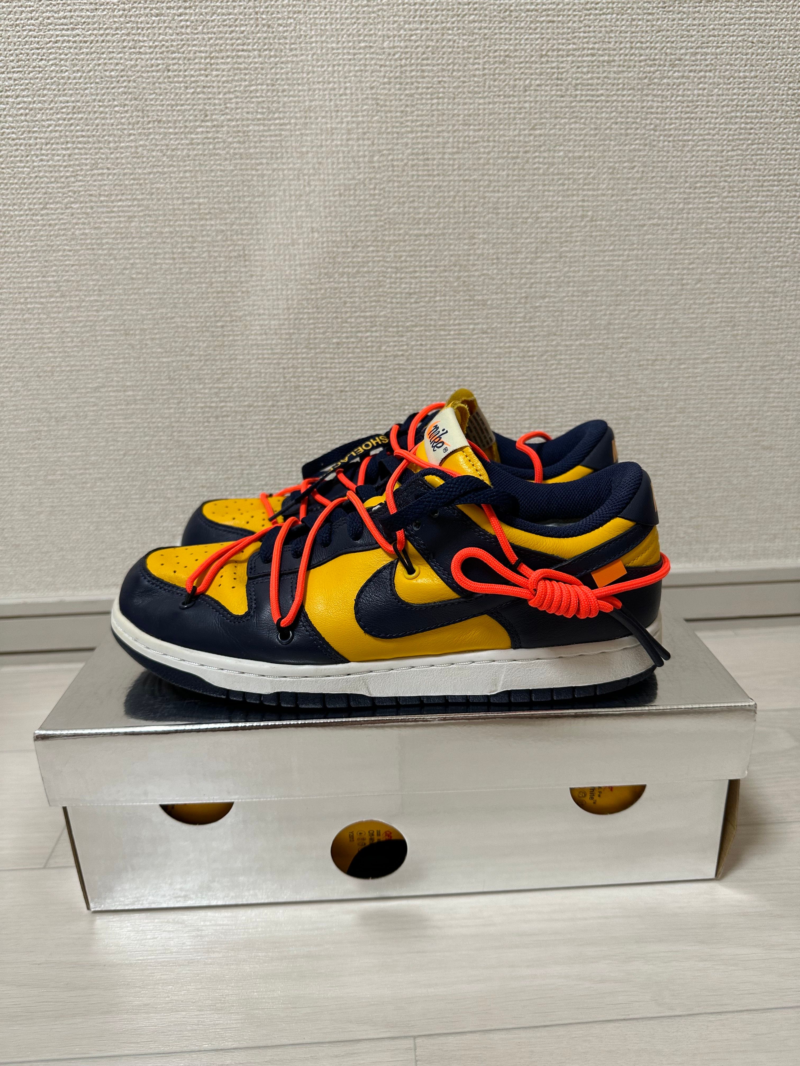 Off-White × Nike Dunk Low LTHR "University Gold/Midnight Navy/White"