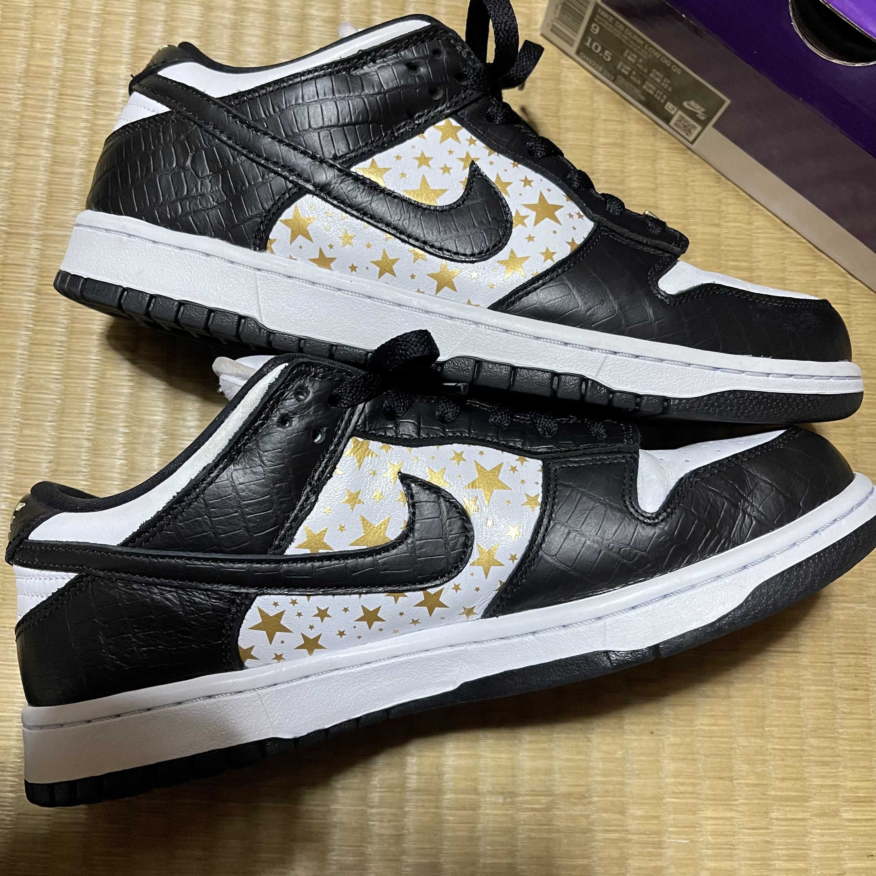 Supreme × Nike SB Dunk Low OG QS Gold Stars "White/Black"