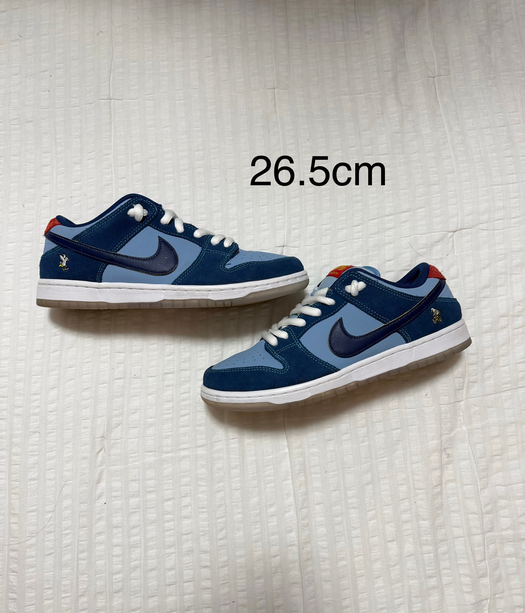 Why So Sad? × Nike SB Dunk Low "Coastal Blue/Speed Yellow-University Red"