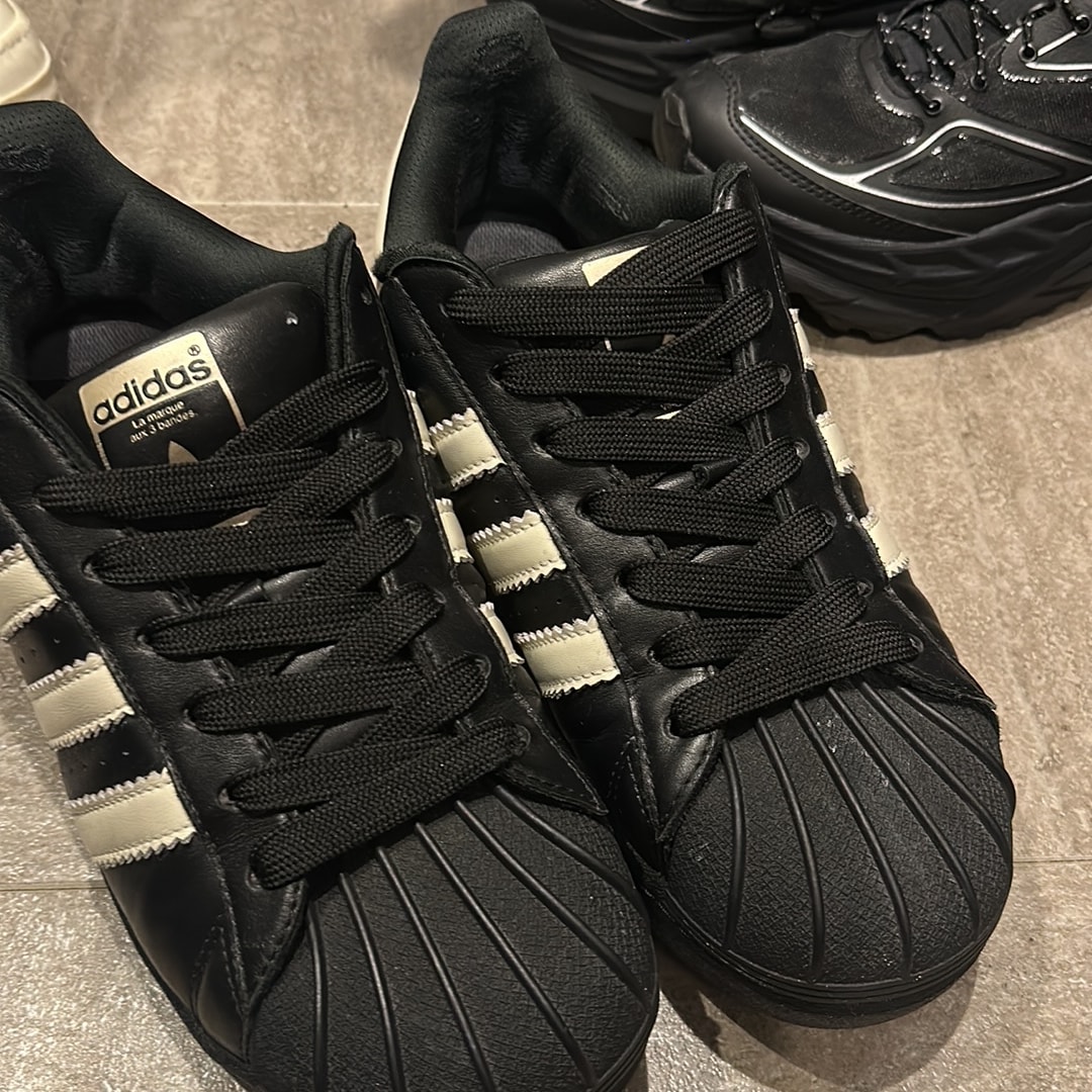 Pharrell Williams × adidas Superstar 92 "Core Black/Sky Rush/Cream White"