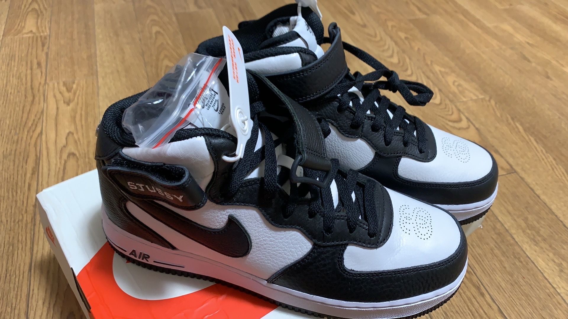 Stussy × Nike Air Force 1 Mid "Black and Light Bone"