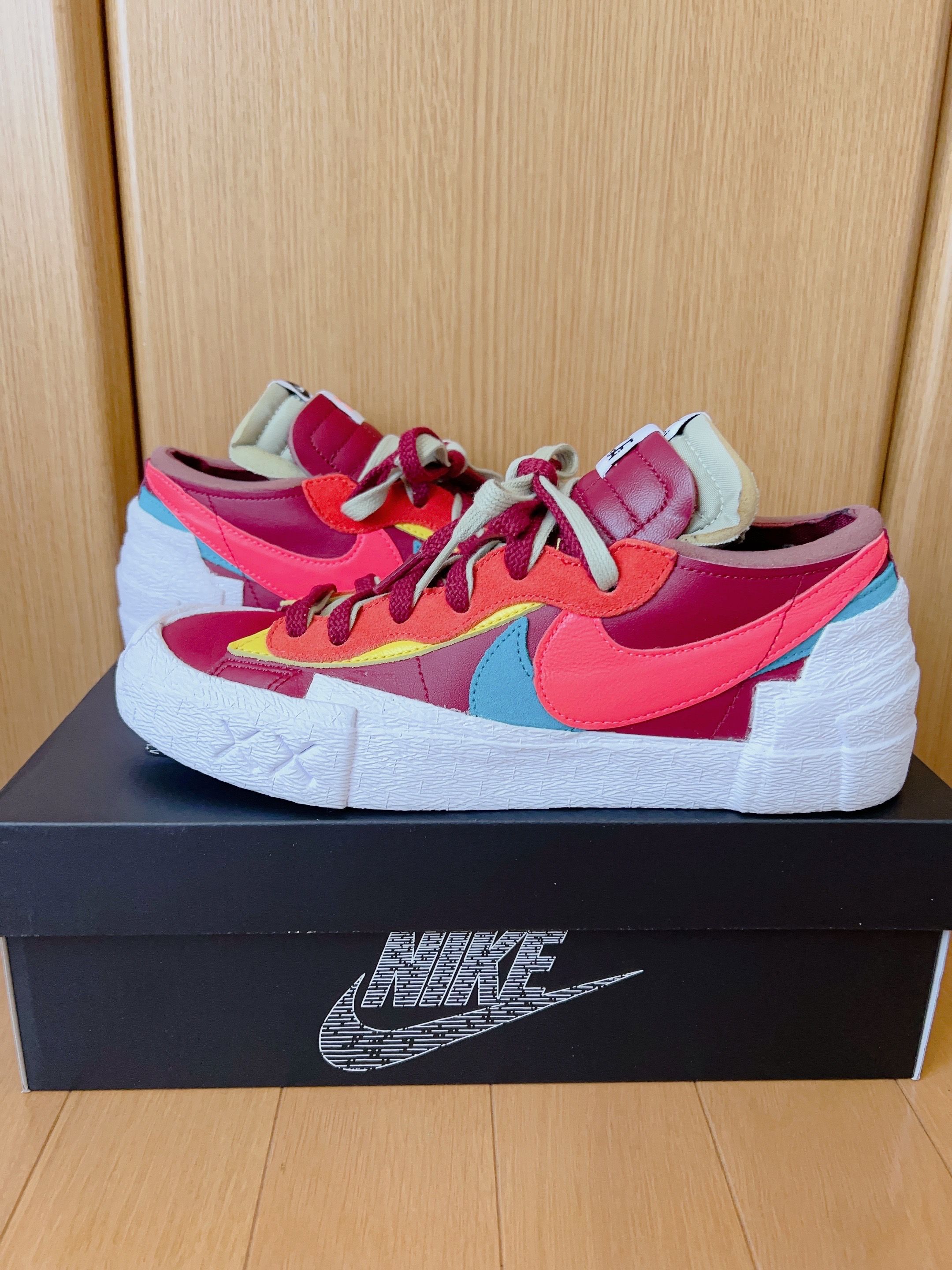 KAWS × sacai × Nike Blazer Low "Team Red"