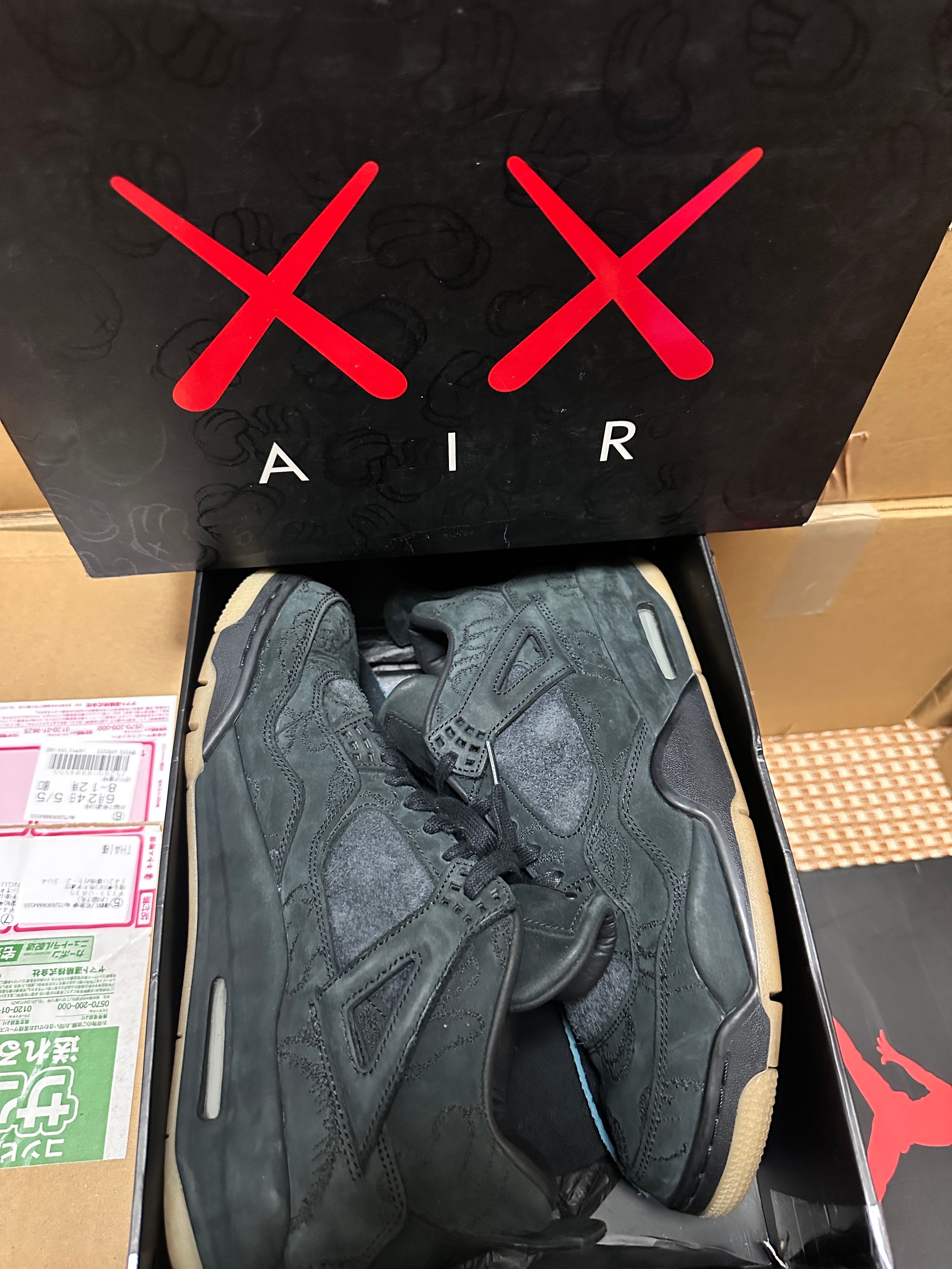 KAWS × Nike Air Jordan 4 Retro "Black"