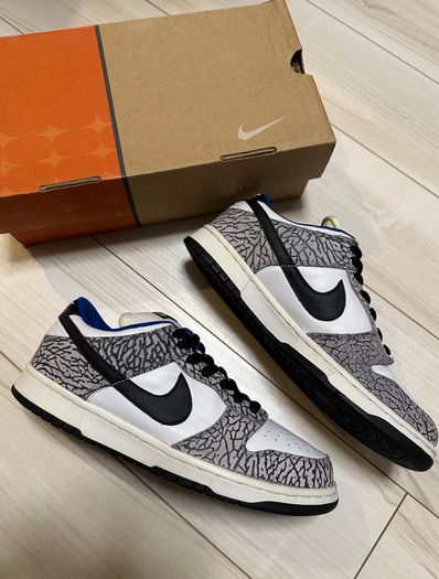 Supreme × Nike SB Dunk Low "White Cement/Safari" (2002)