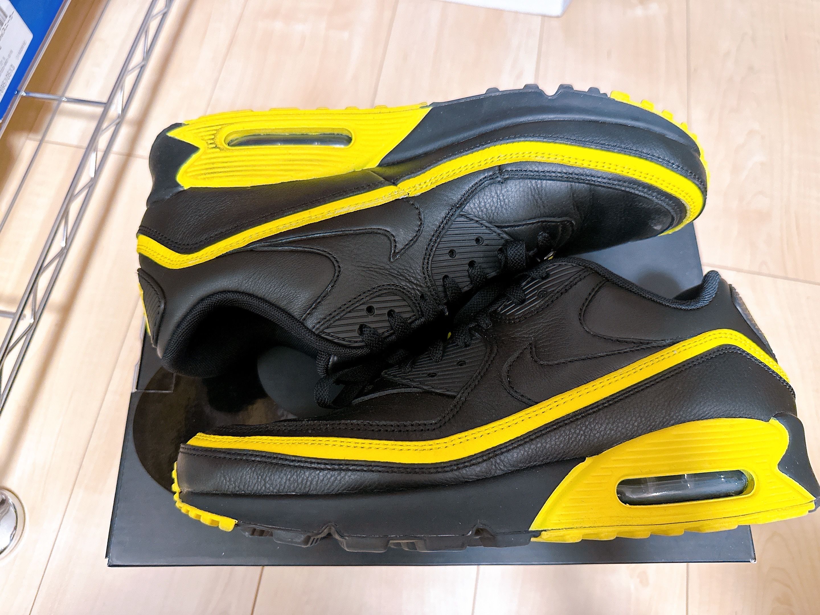 UNDEFEATED × Nike Air Max 90 "Black/Yellow"