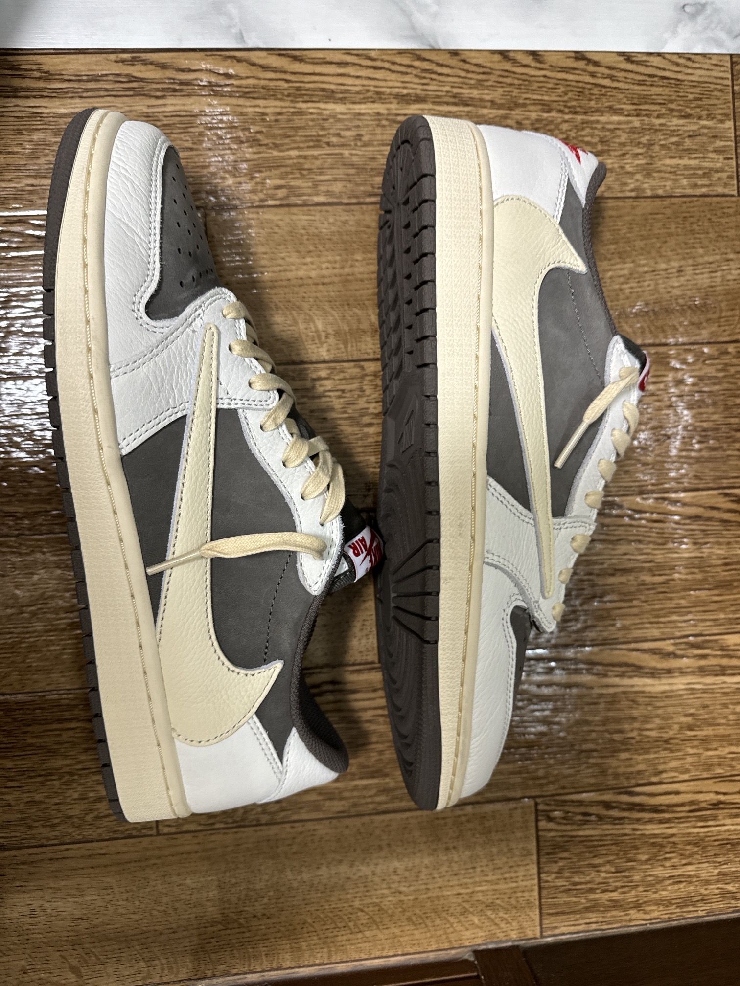 Travis Scott × Nike Air Jordan 1 Low OG SP "Reverse Mocha/Sail and Ridgerock"