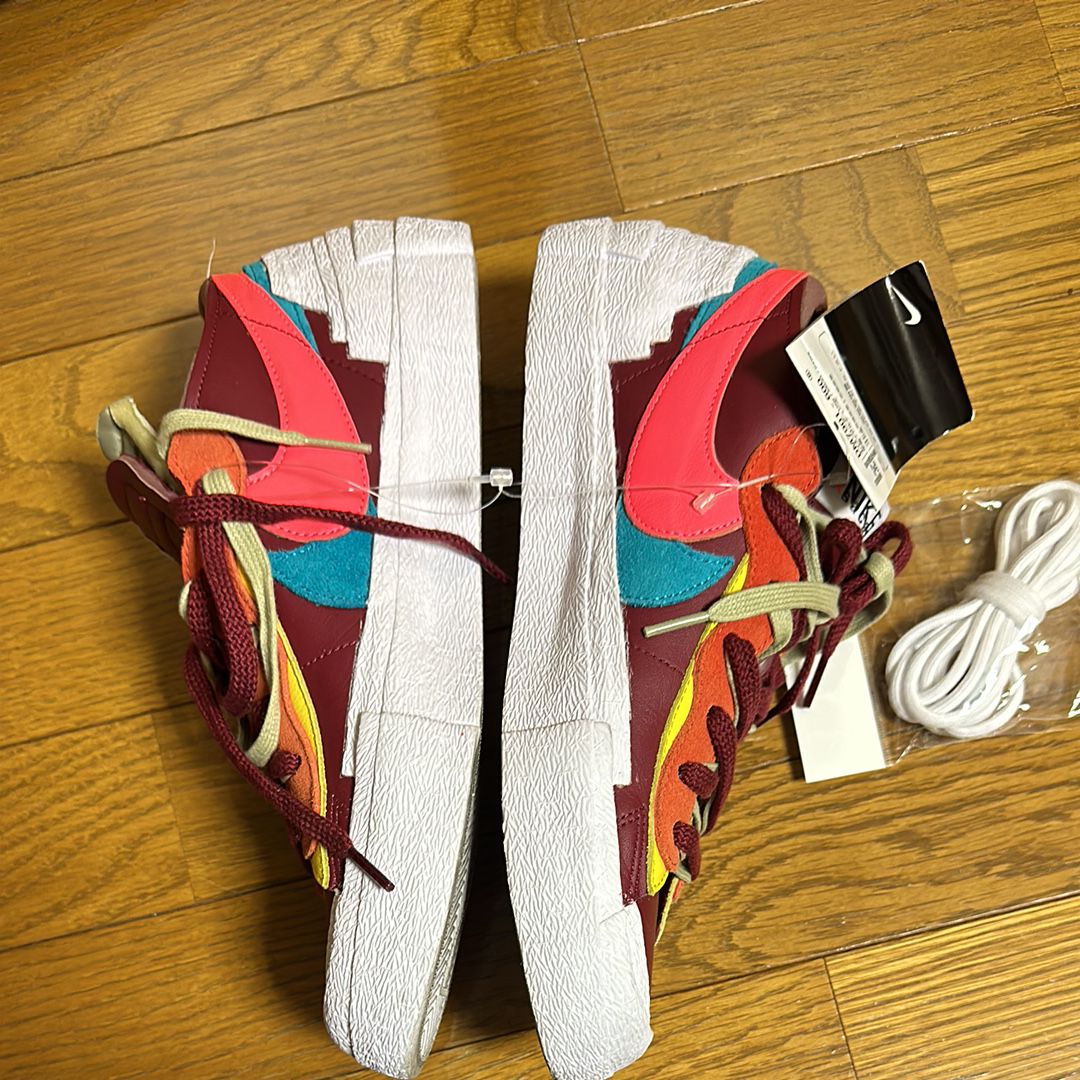 KAWS × sacai × Nike Blazer Low "Team Red"