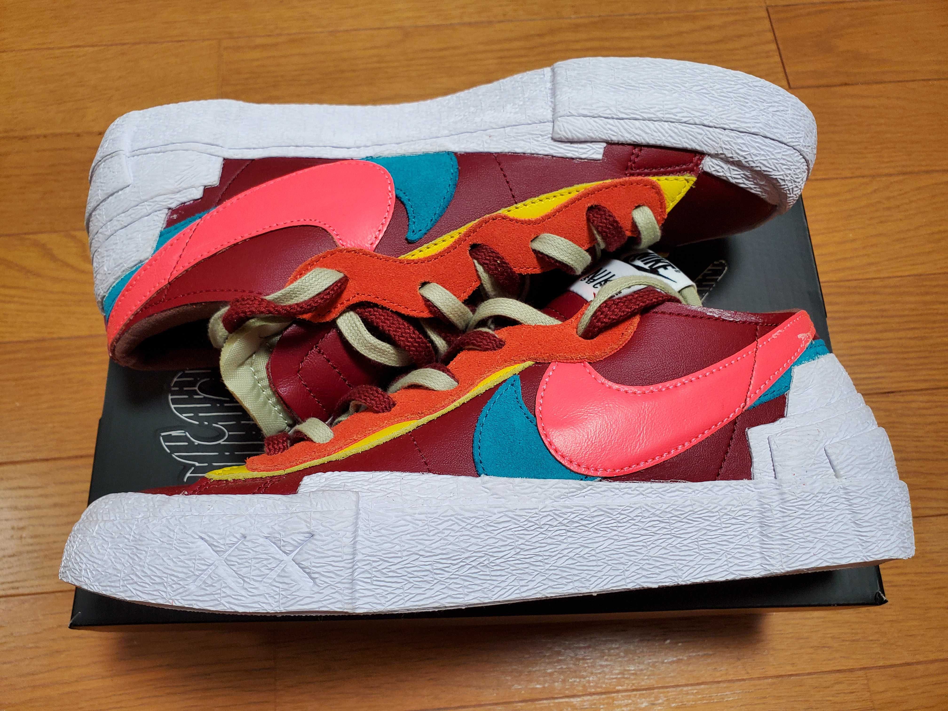 KAWS × sacai × Nike Blazer Low "Team Red"