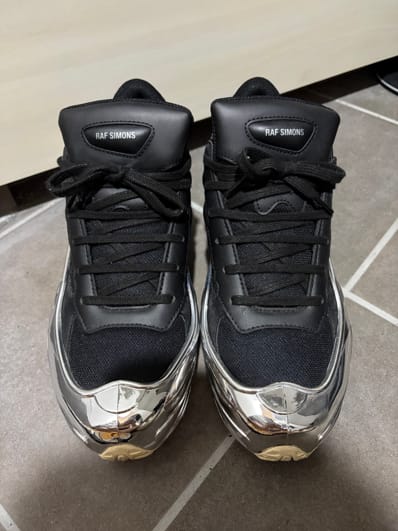 RAF SIMONS × adidas Ozweego "Black/Silver Metallic"