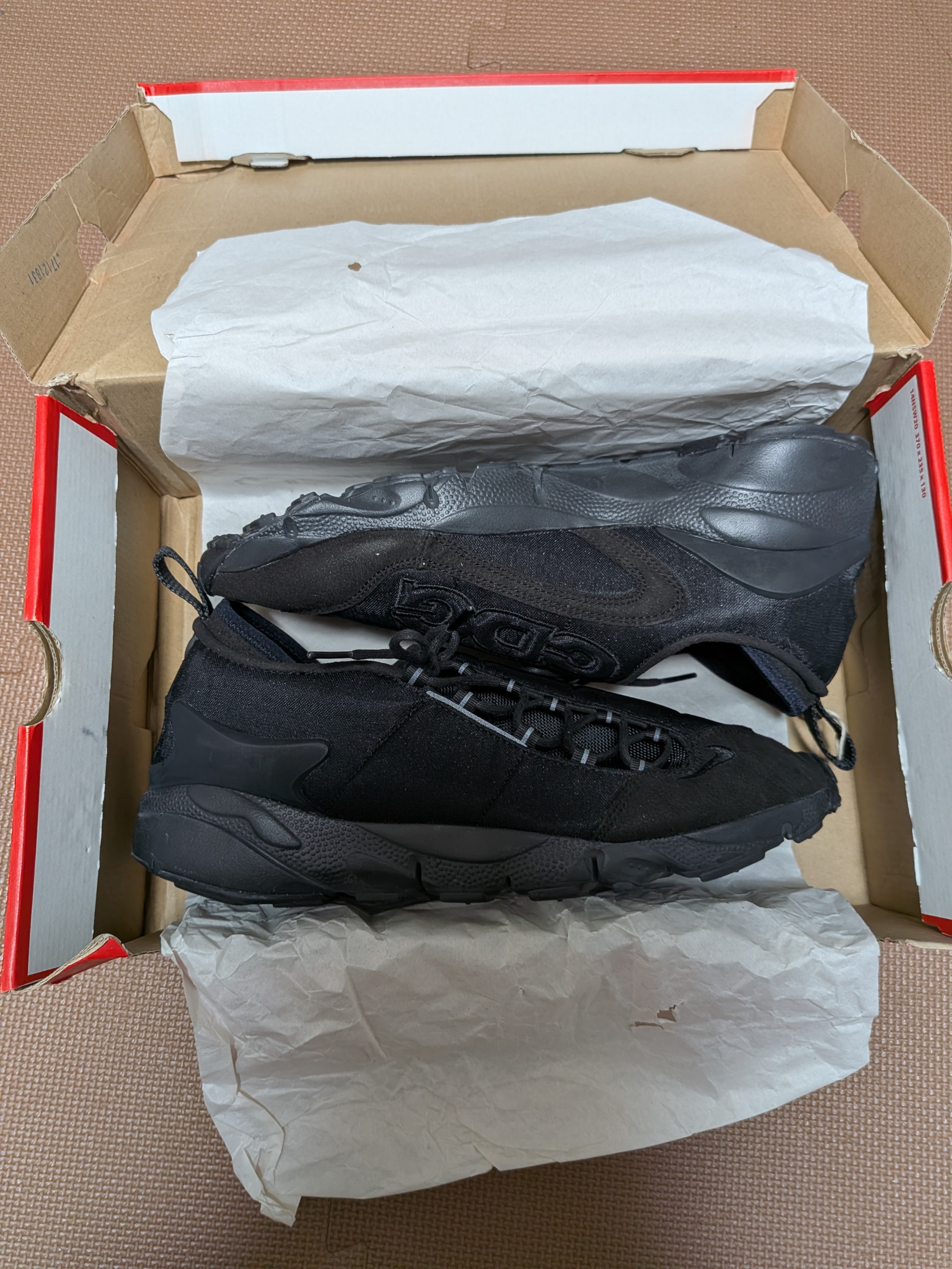 COMME des GARCONS × Nike Air Footscape NM "Black"