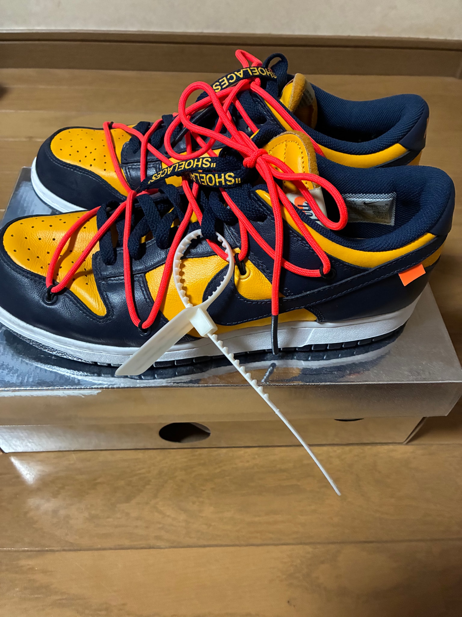 Off-White × Nike Dunk Low  LTHR "University Gold/Midnight Navy/White"