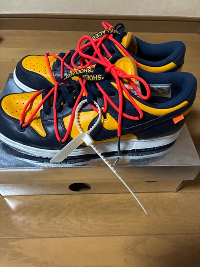 Off-White × Nike Dunk Low LTHR "University Gold/Midnight Navy/White"