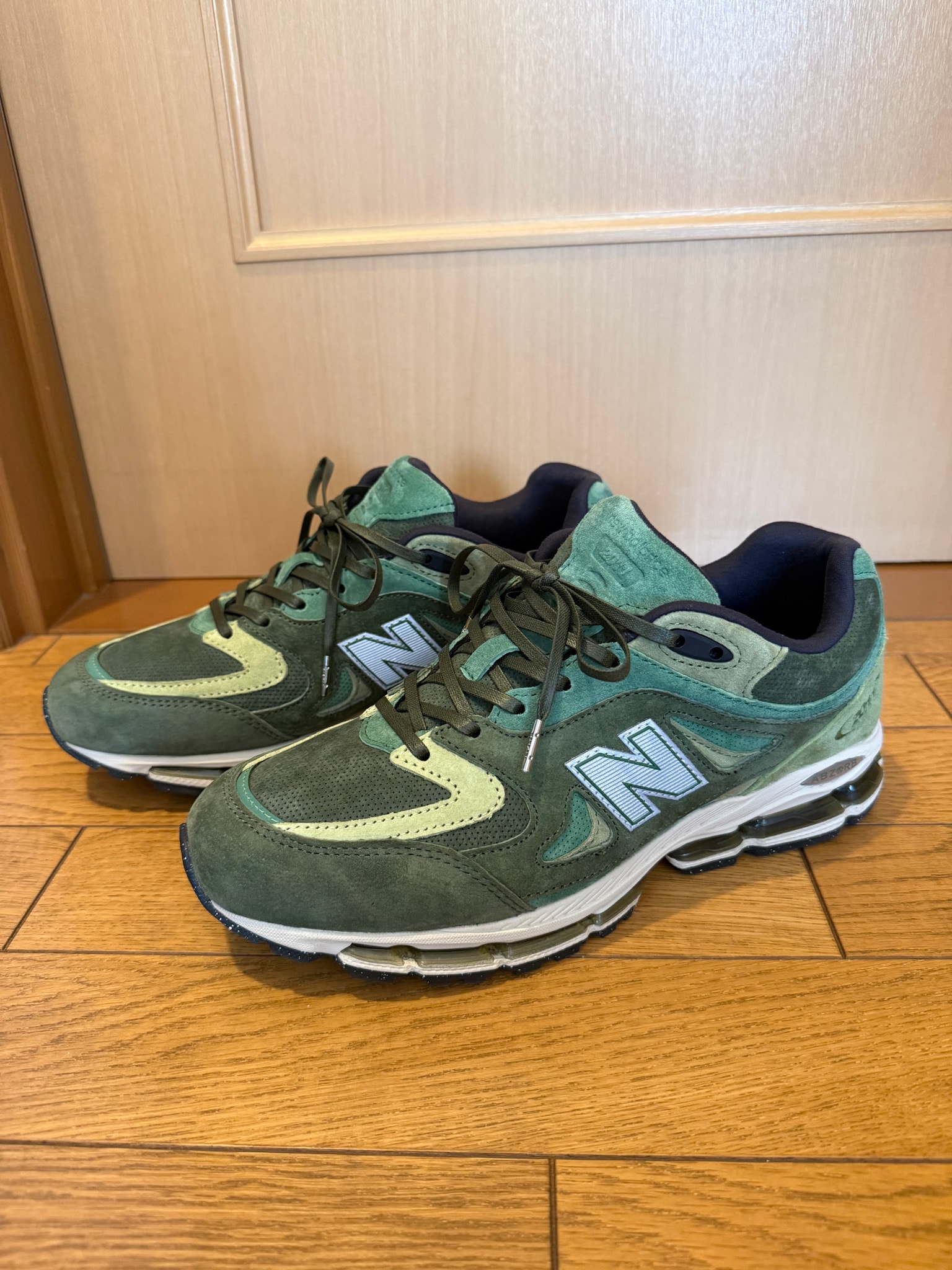 KITH × New Balance 2011 "Juniper/Bronze Green"