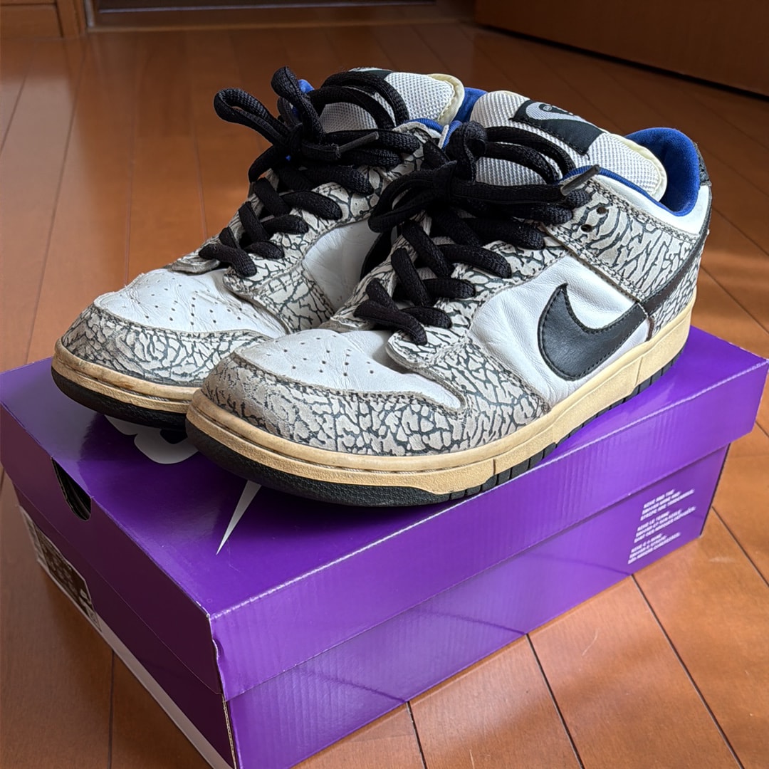 Supreme × Nike SB Dunk Low "White Cement/Safari" (2002)