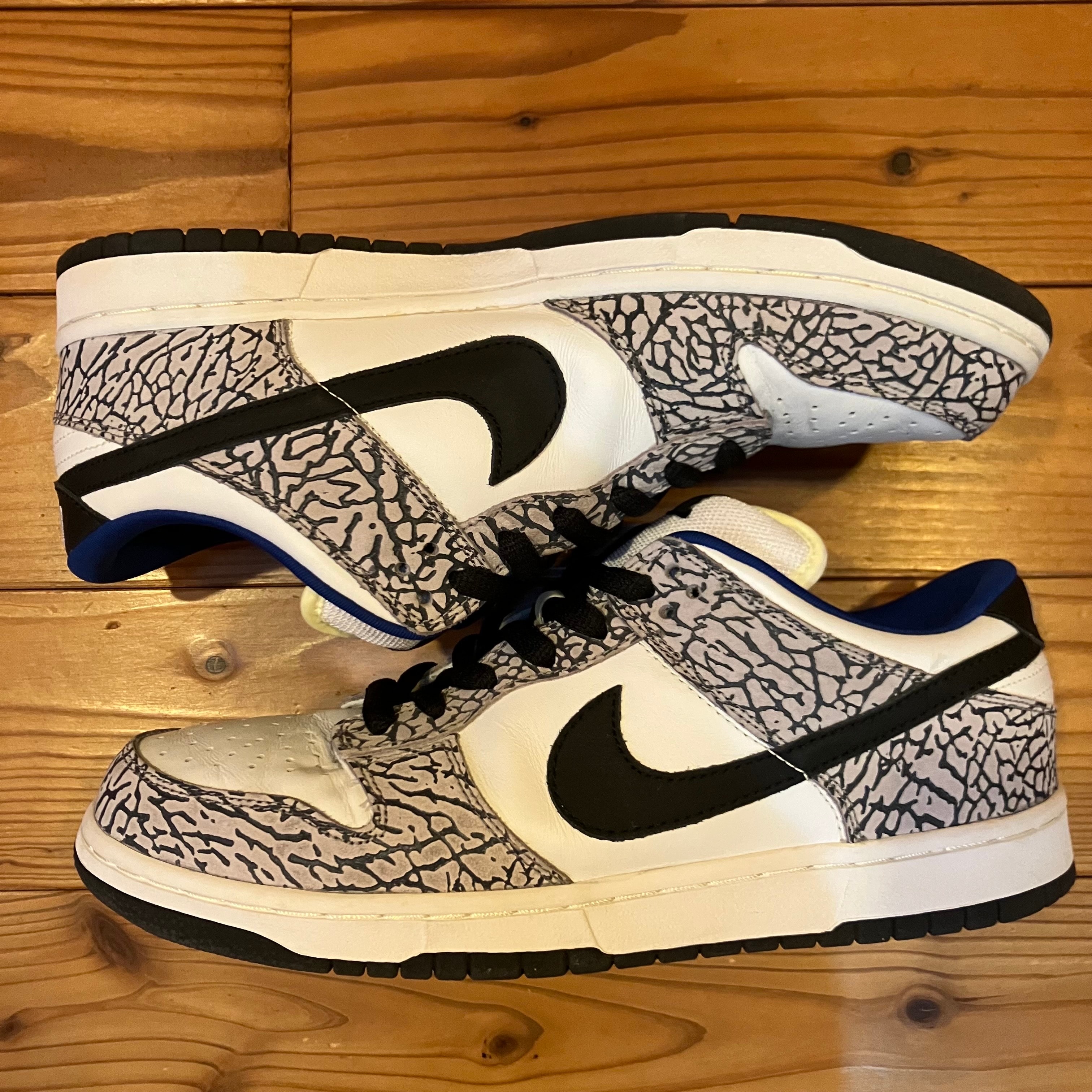 Supreme × Nike SB Dunk Low "White Cement/Safari" (2002)