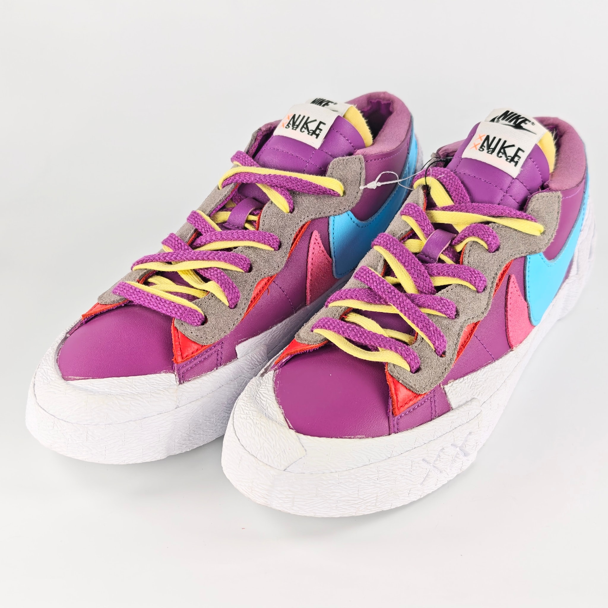 KAWS × sacai × Nike Blazer Low "Purple Dusk"