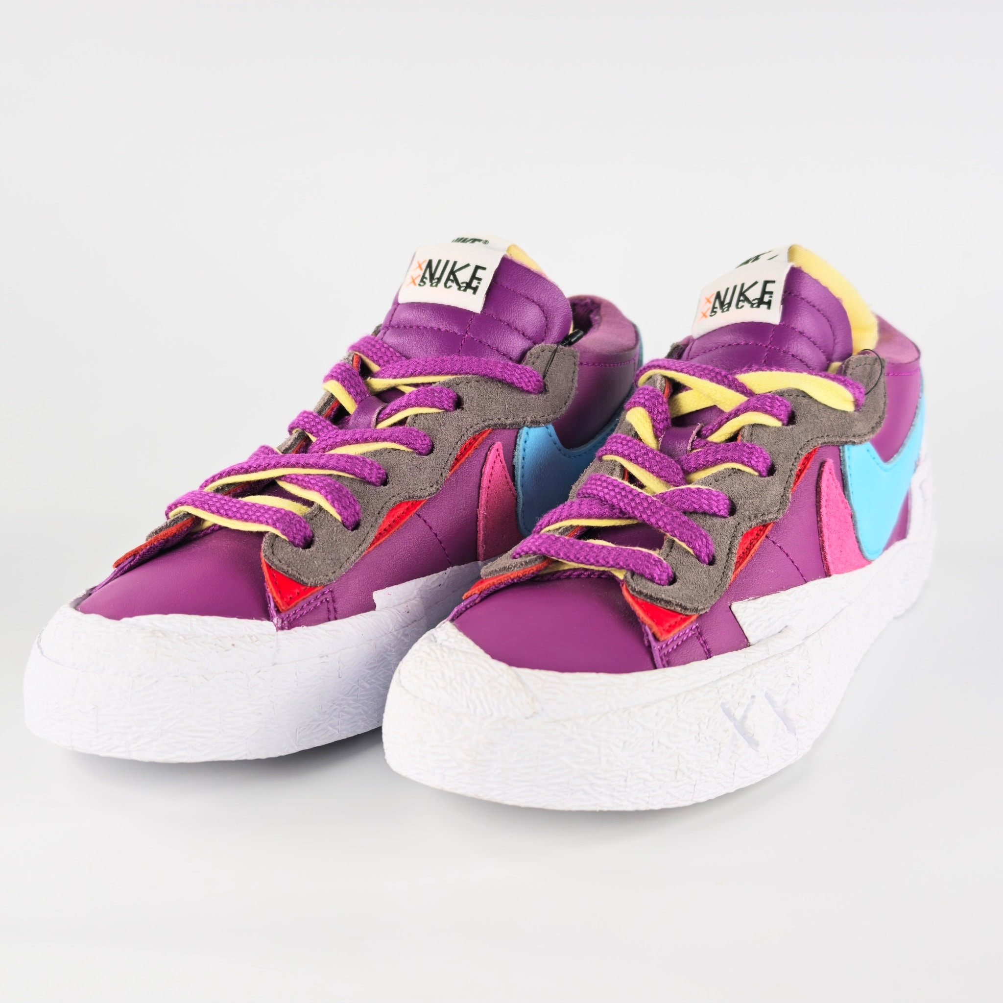 KAWS × sacai × Nike Blazer Low "Purple Dusk"