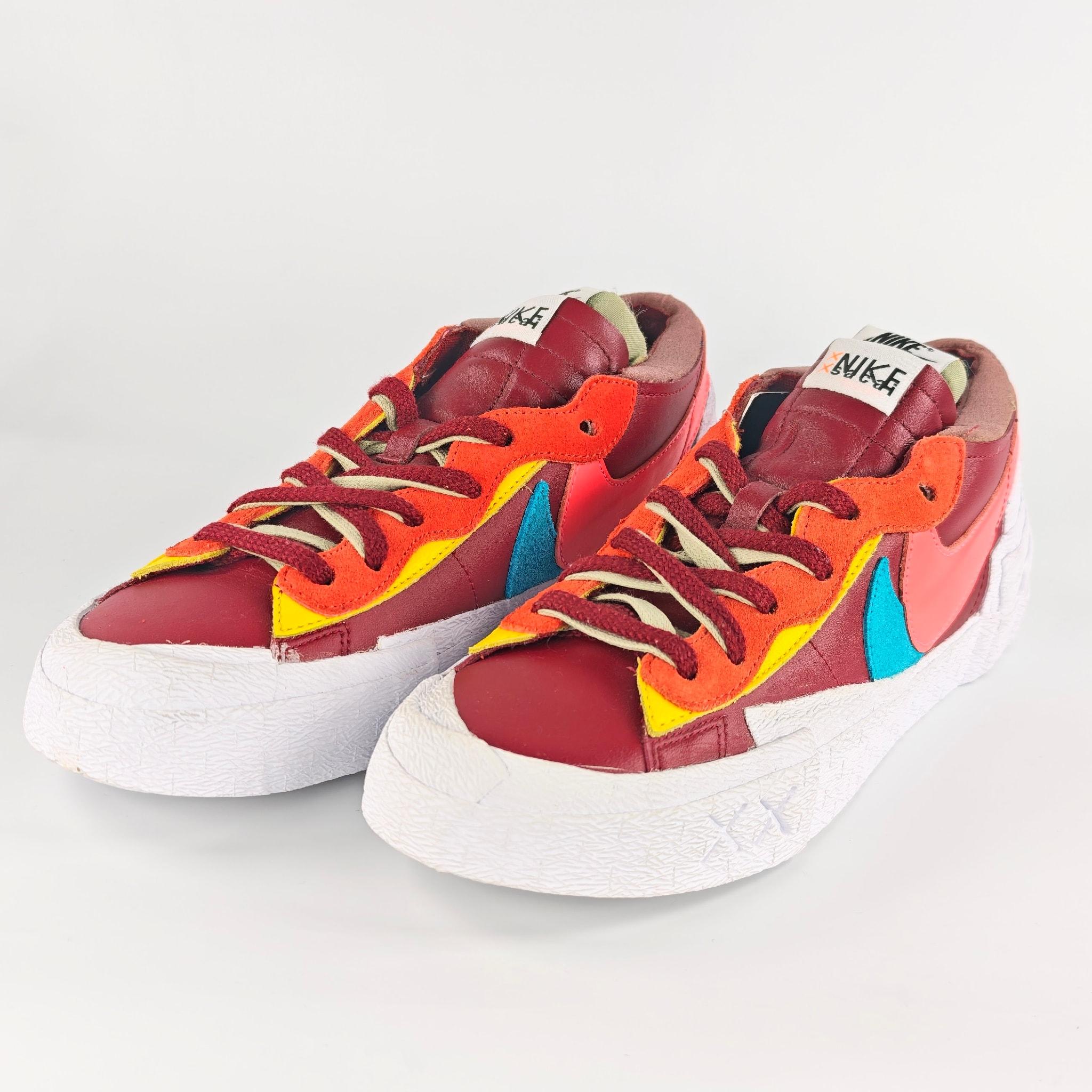 KAWS × sacai × Nike Blazer Low "Team Red"