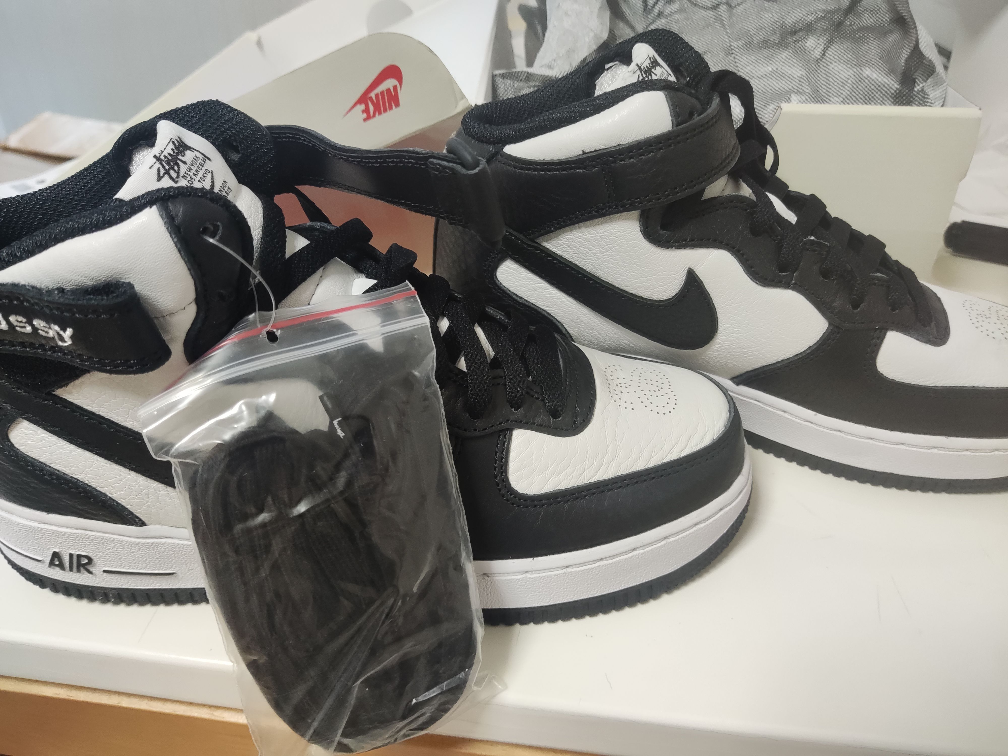 Stussy × Nike Air Force 1 Mid "Black and Light Bone"