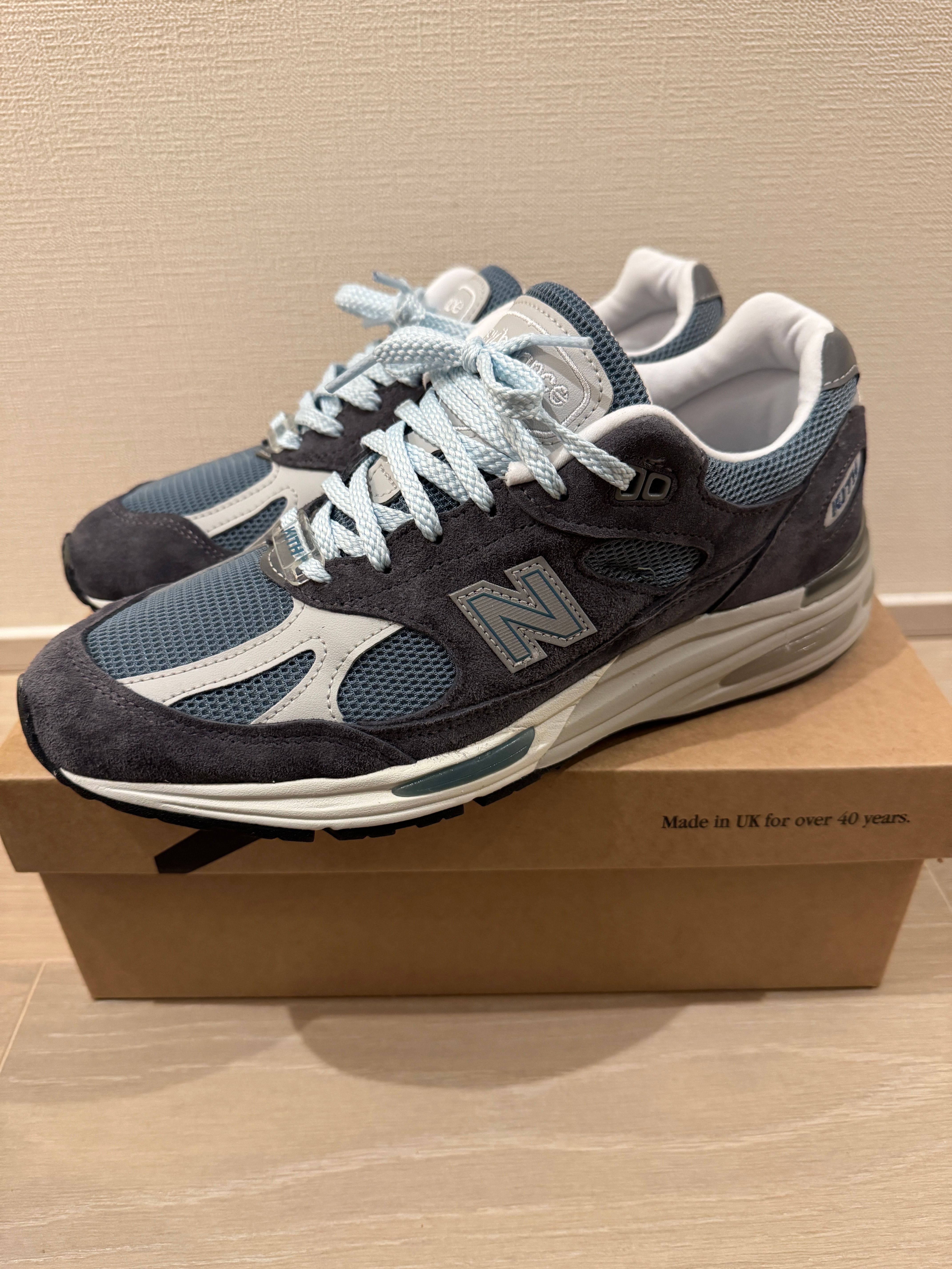 KITH × New Balance 991V2 "Asphalt/Lead/Oyster Mushroom"