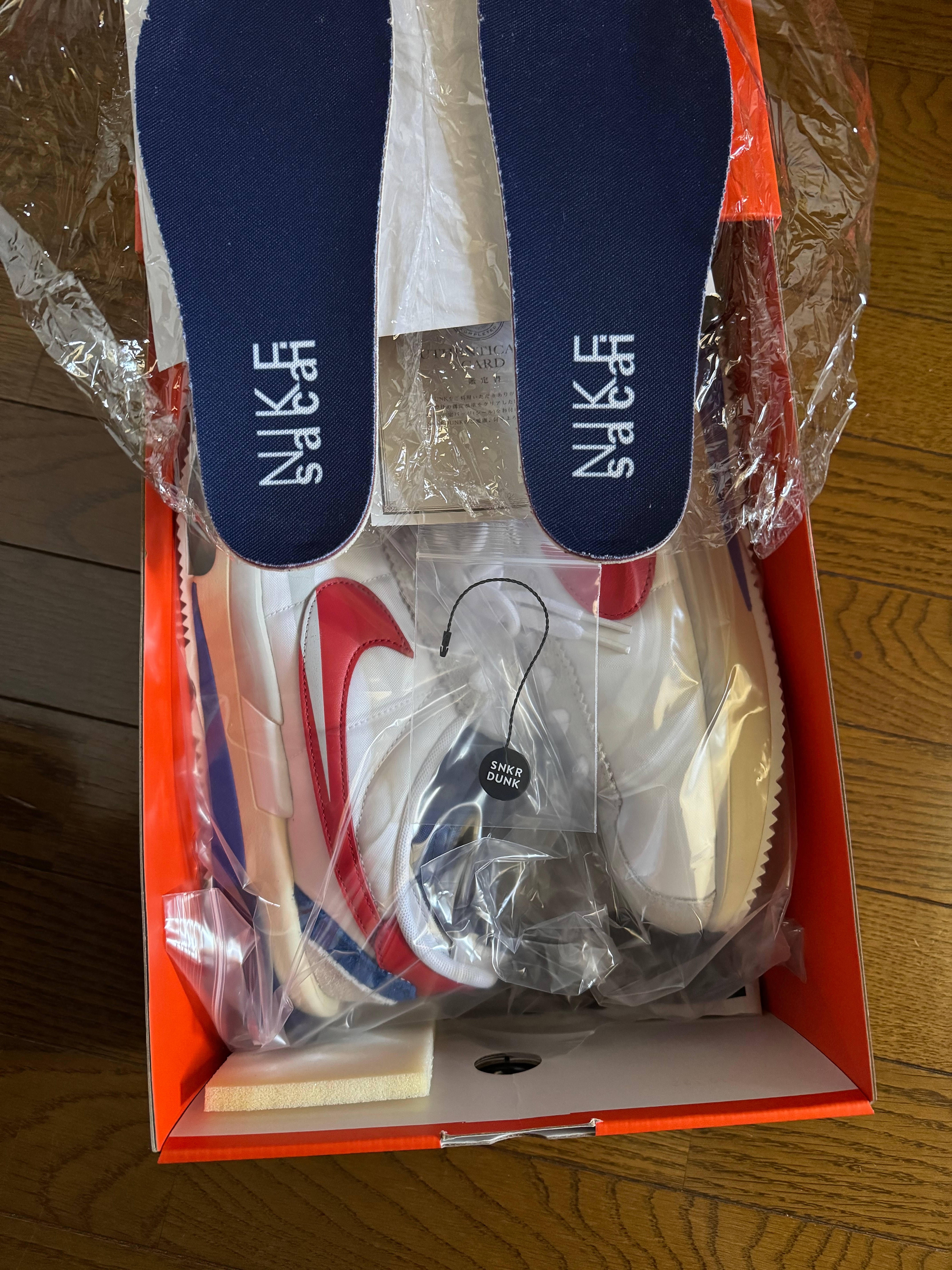 sacai × Nike Zoom Cortez "White and University Red"