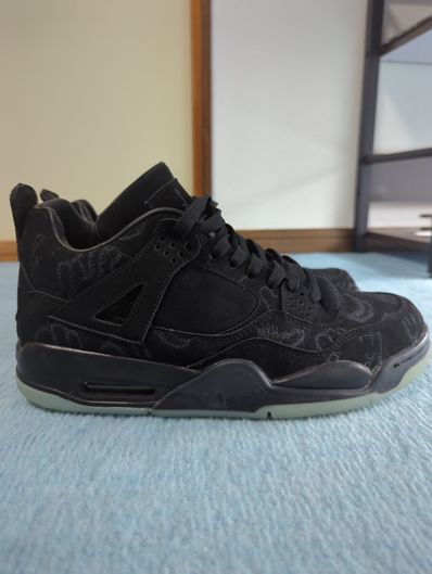 KAWS × Nike Air Jordan 4 Retro "Black"