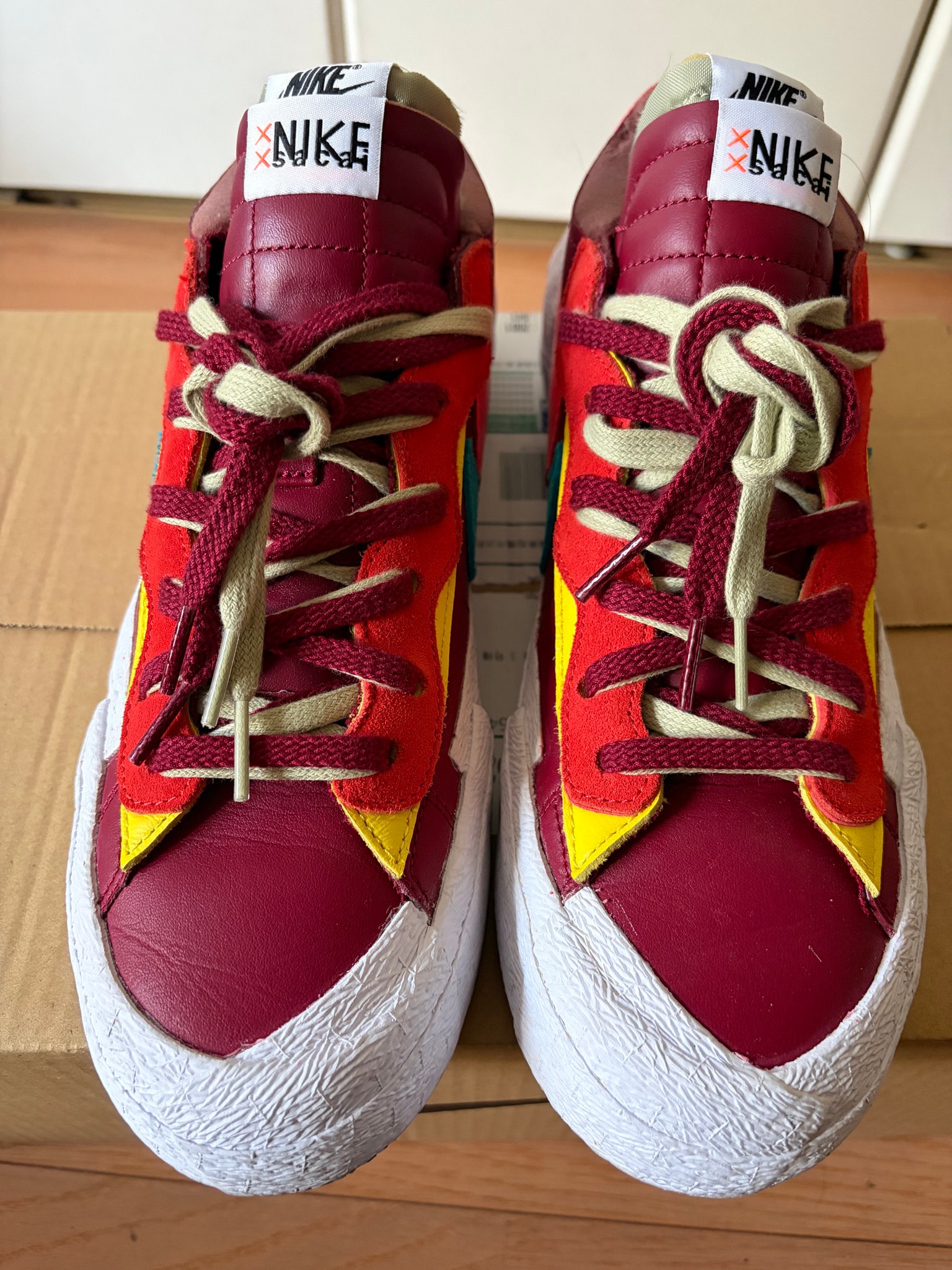 KAWS × sacai × Nike Blazer Low "Team Red"