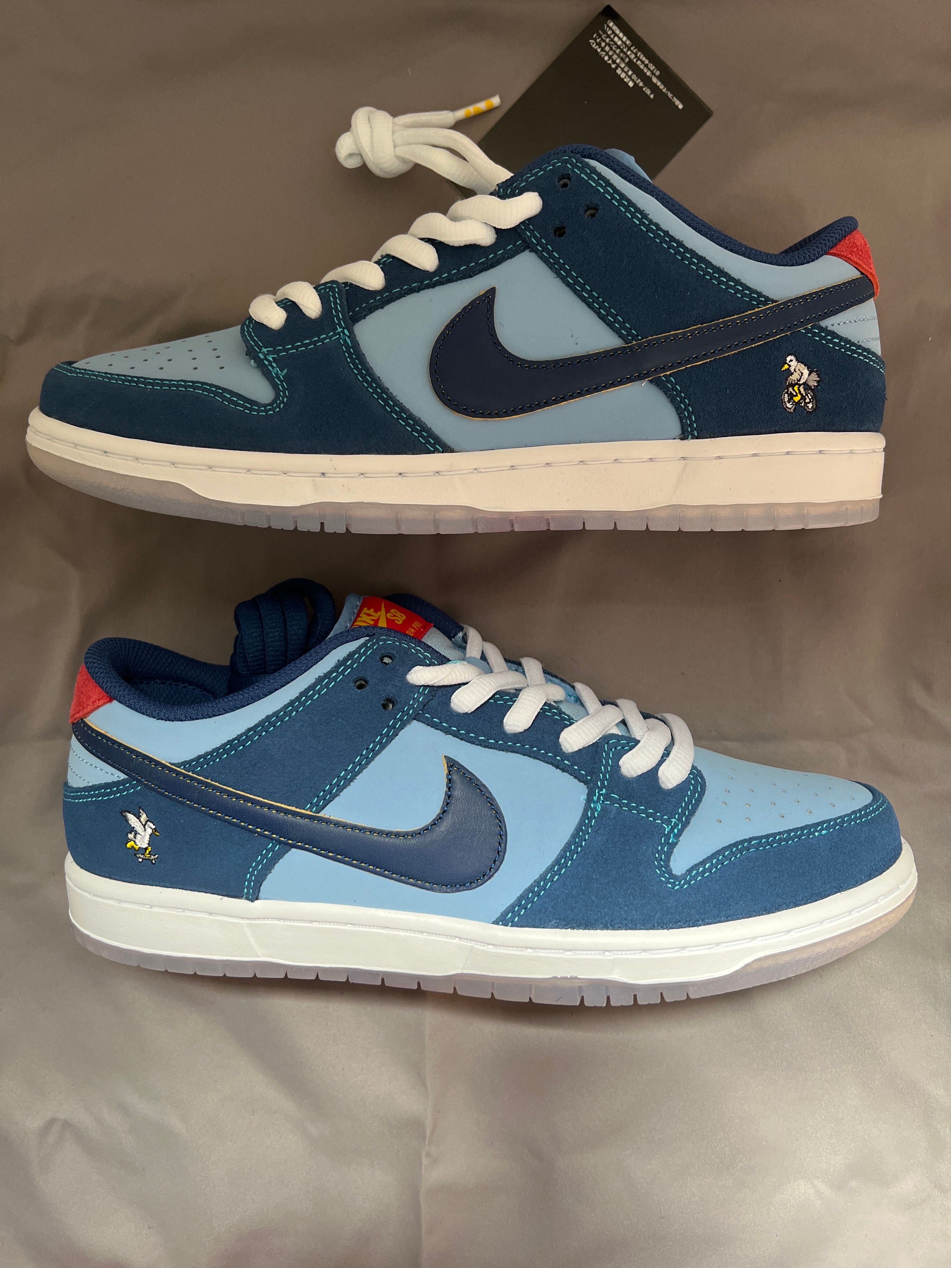 Why So Sad? × Nike SB Dunk Low "Coastal Blue/Speed Yellow-University Red"