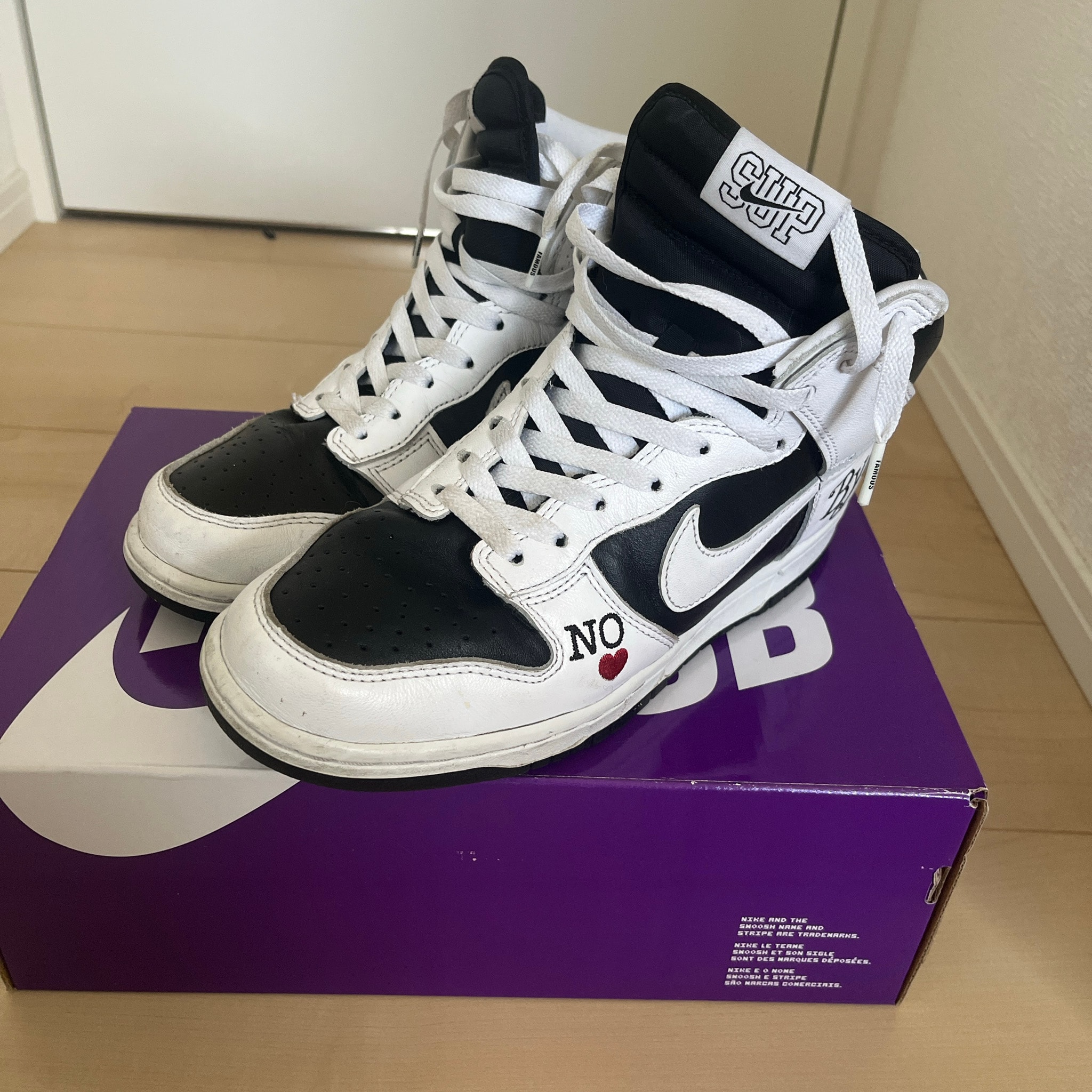 Supreme × Nike SB Dunk High By Any Means "White Black"