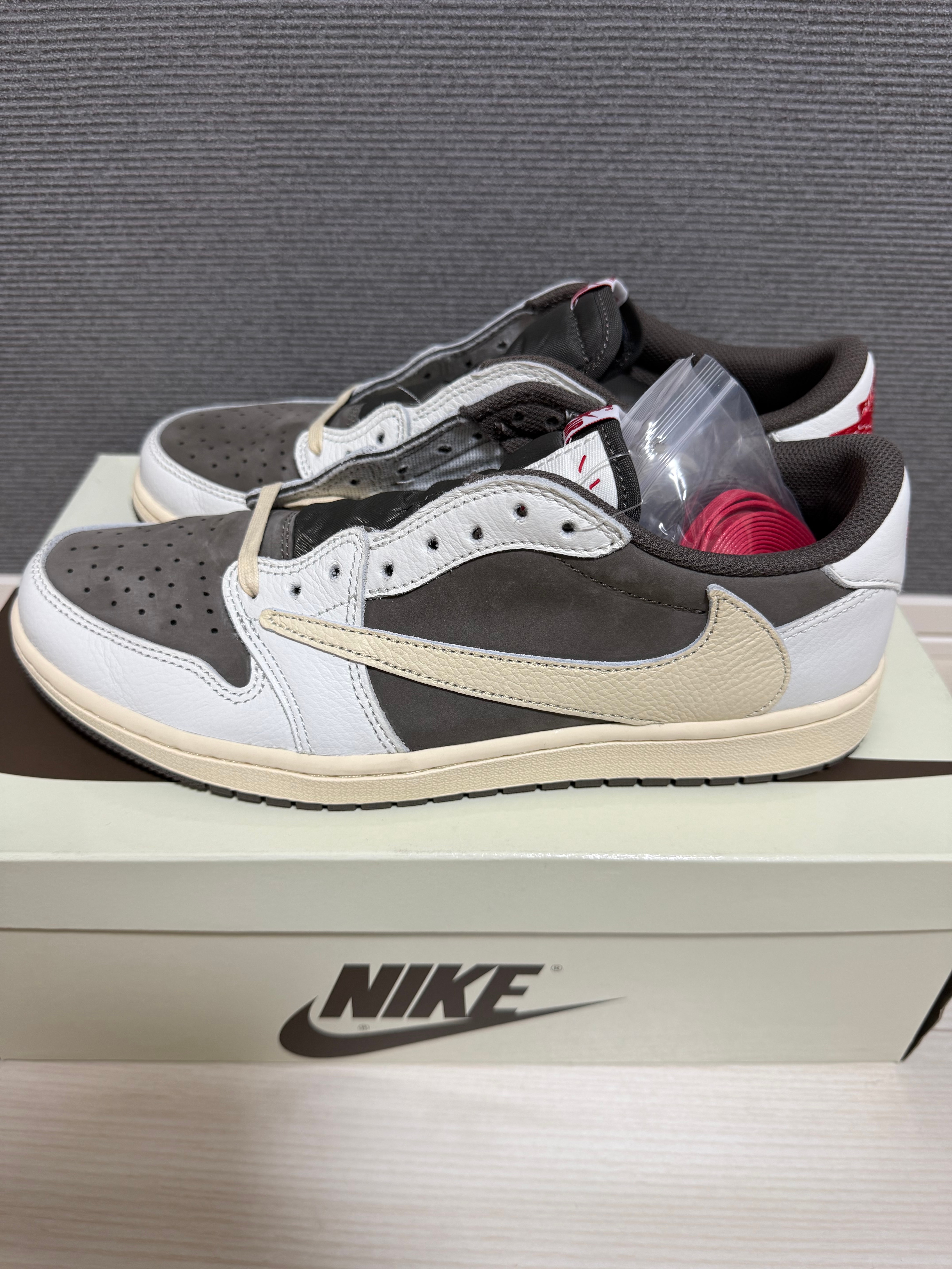 Travis Scott × Nike Air Jordan 1 Low OG SP "Reverse Mocha/Sail and Ridgerock"