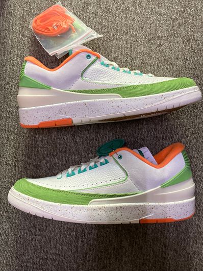 The Titan × Nike Women's Air Jordan 2 Low "Safety Orange/Chlorophyll"
