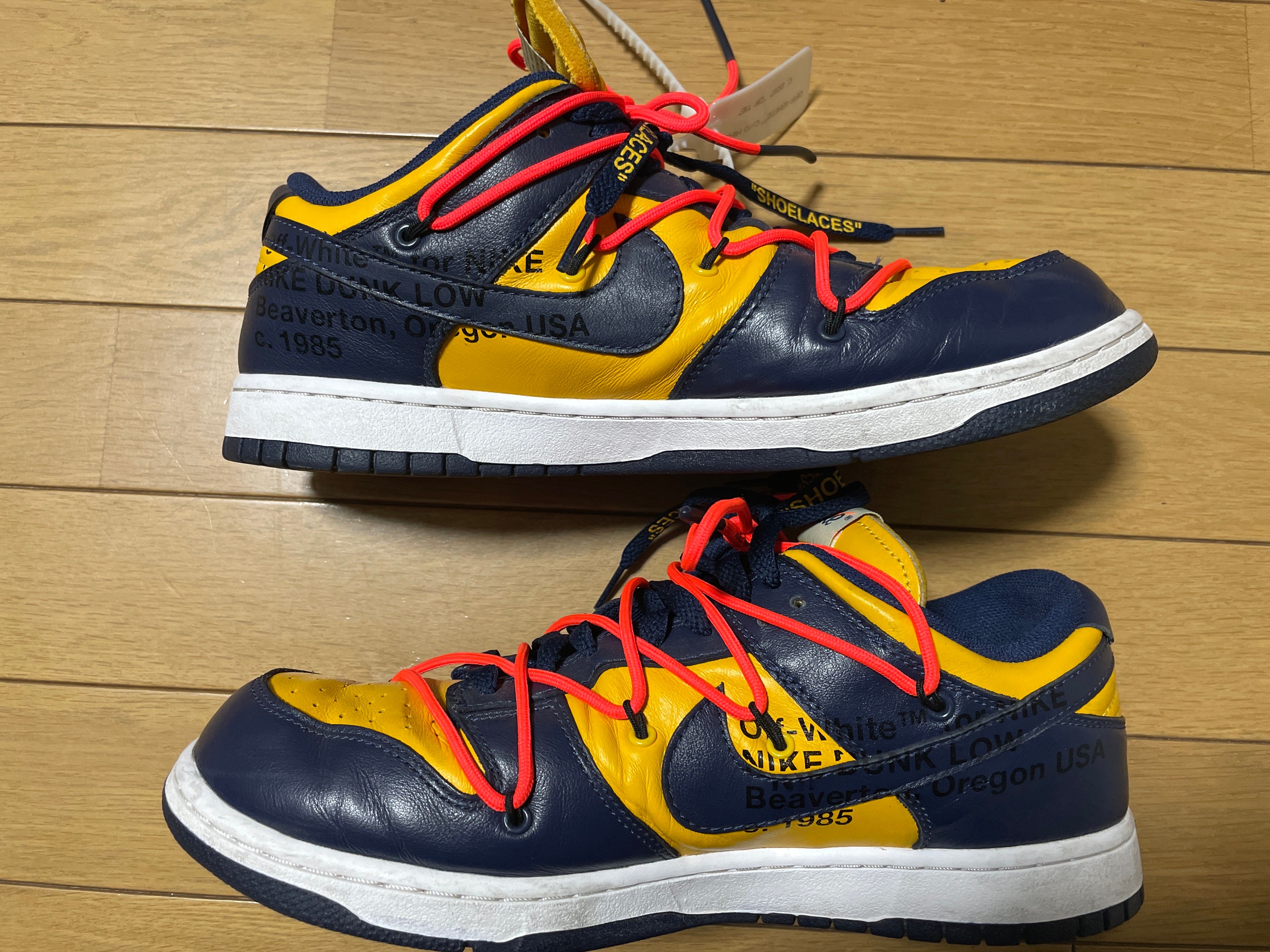 Off-White × Nike Dunk Low LTHR "University Gold/Midnight Navy/White"