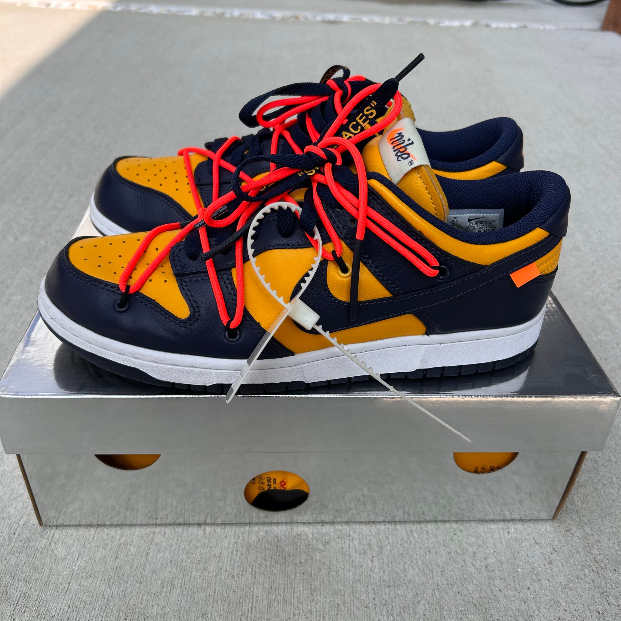 Off-White × Nike Dunk Low  LTHR "University Gold/Midnight Navy/White"