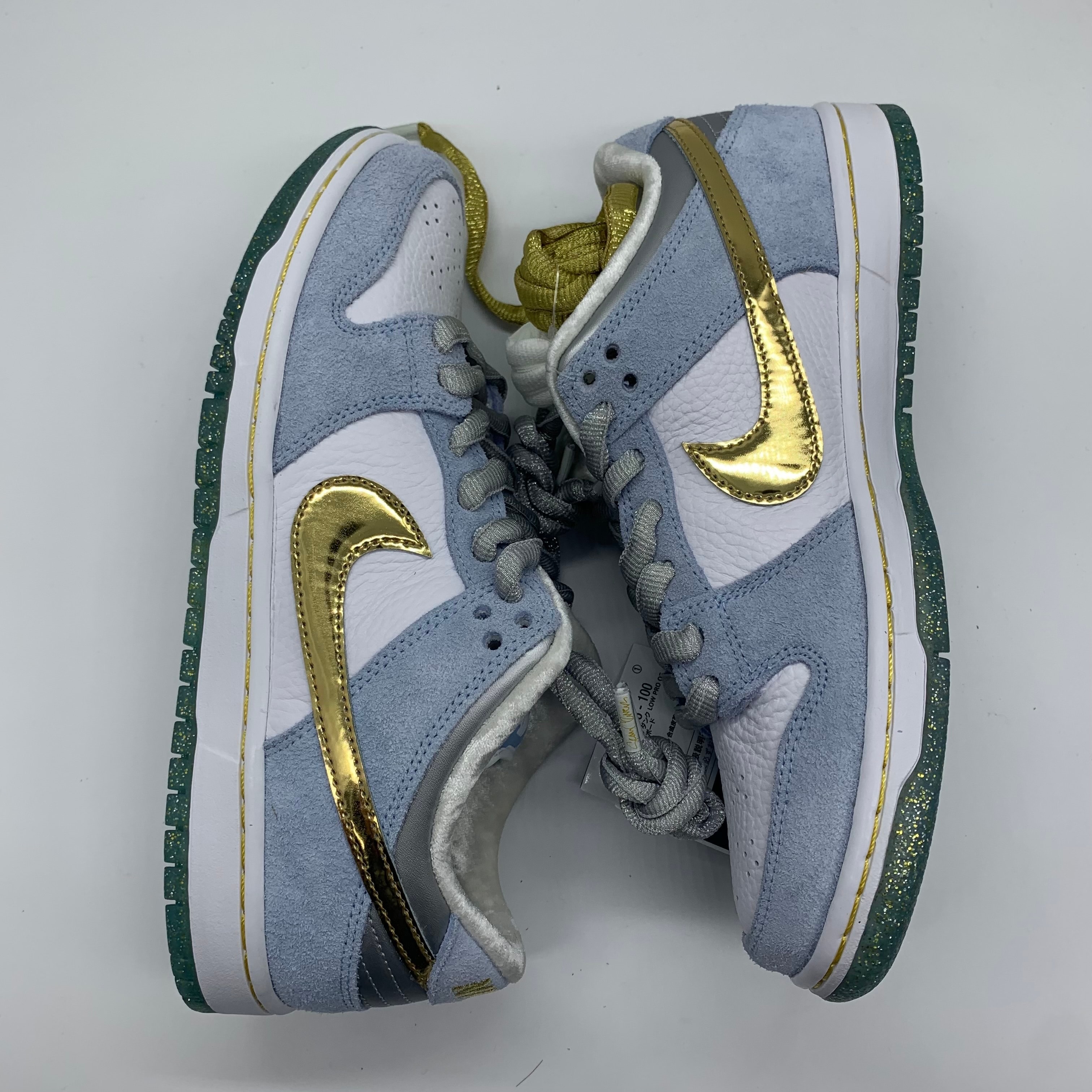 Sean Cliver × Nike SB Dunk Low "Holiday Special"