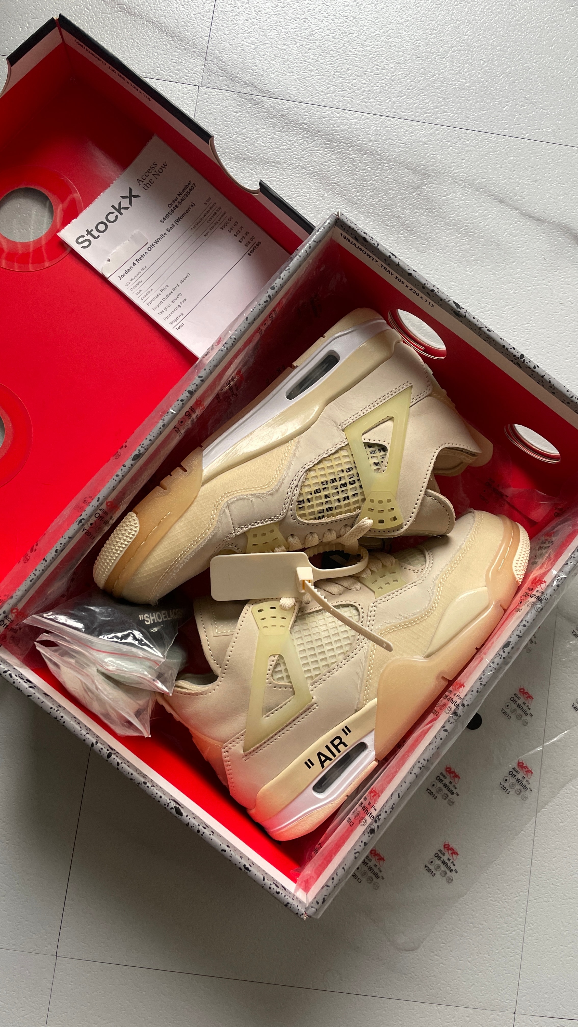 Off-White × Nike Women's Air Jordan 4 SP "Sail"