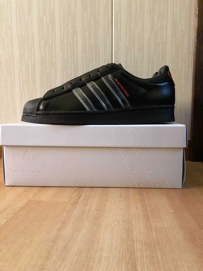 PLEASURES × adidas CONSORTIUM SUPERSTAR "BLACK"