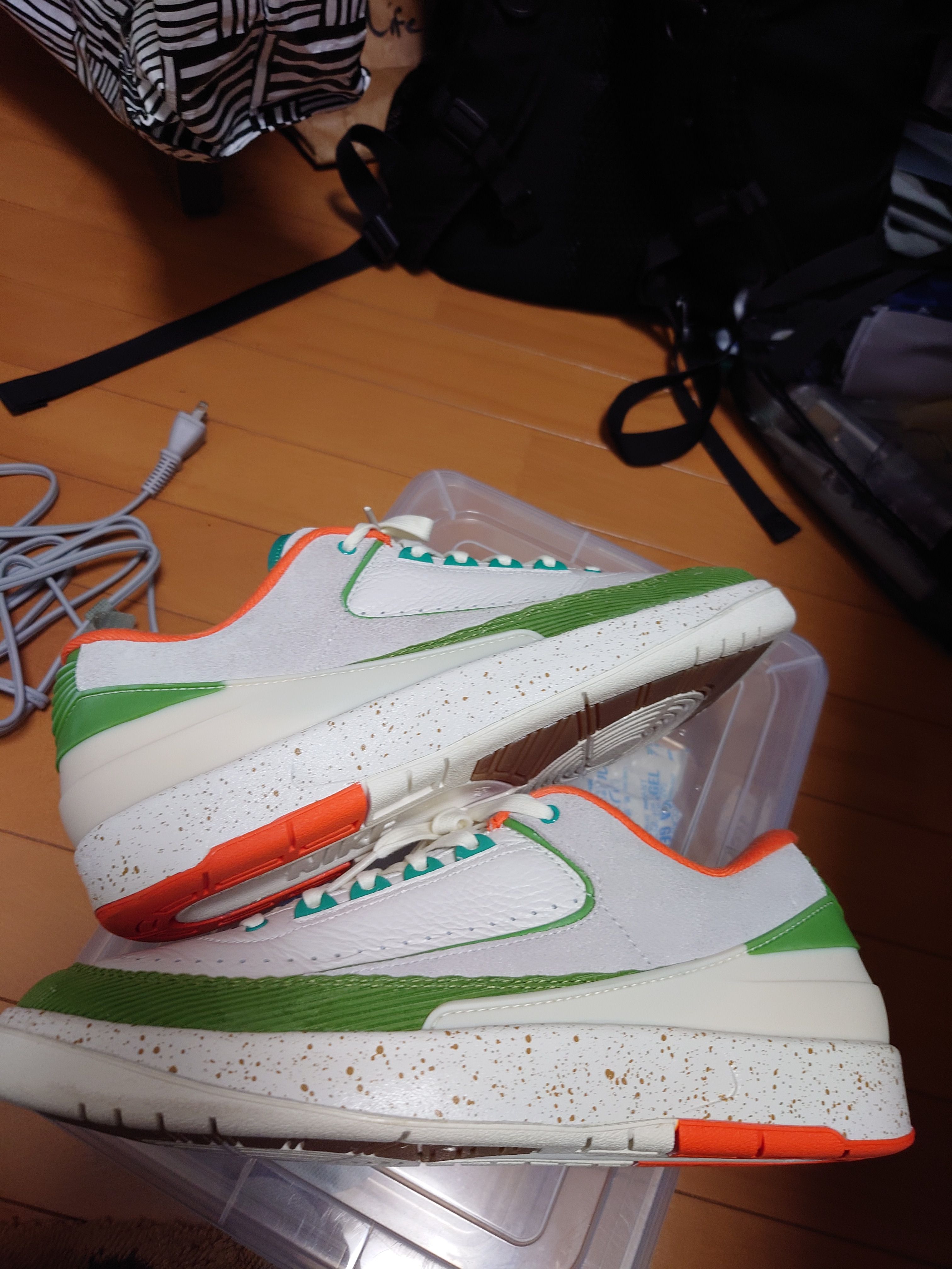 The Titan × Nike Women's Air Jordan 2 Low "Safety Orange/Chlorophyll"