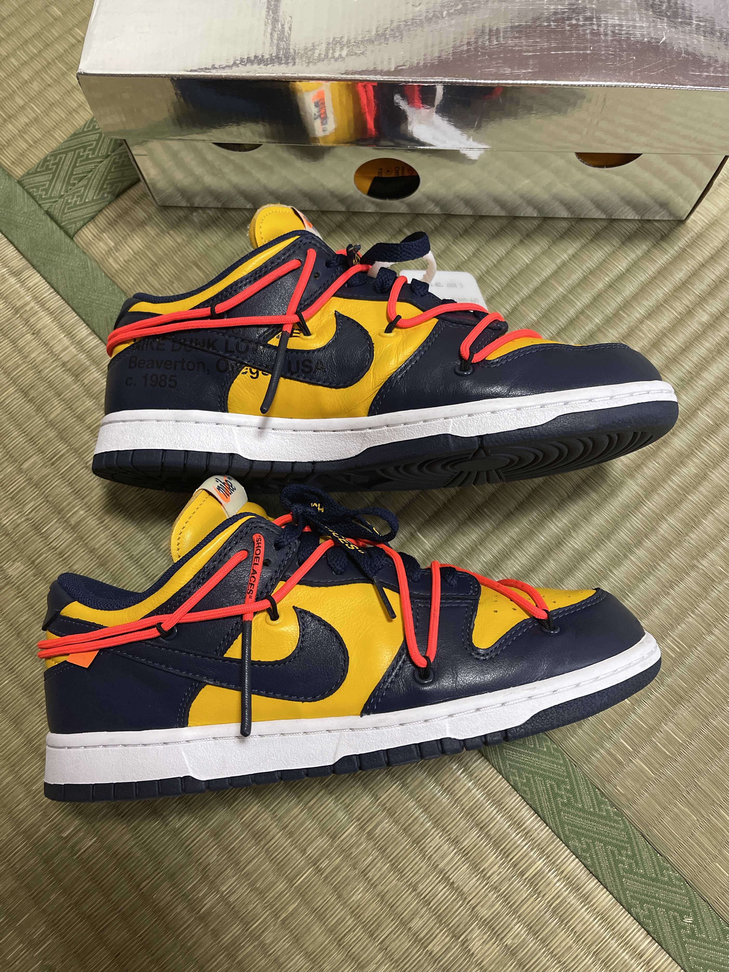 Off-White × Nike Dunk Low LTHR "University Gold/Midnight Navy/White"