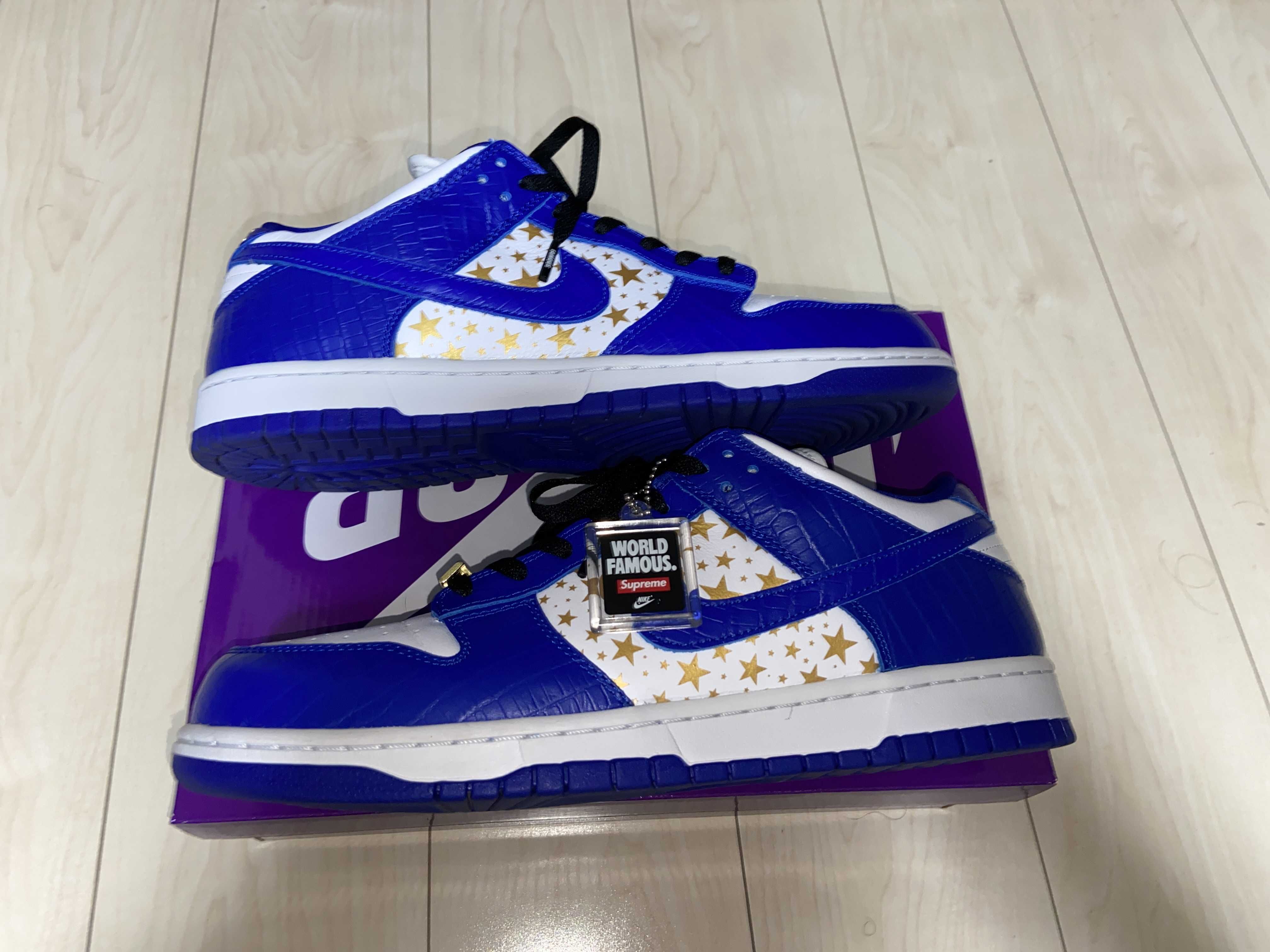 Supreme × Nike SB Dunk Low OG QS Gold Stars "White/Hyper Blue"