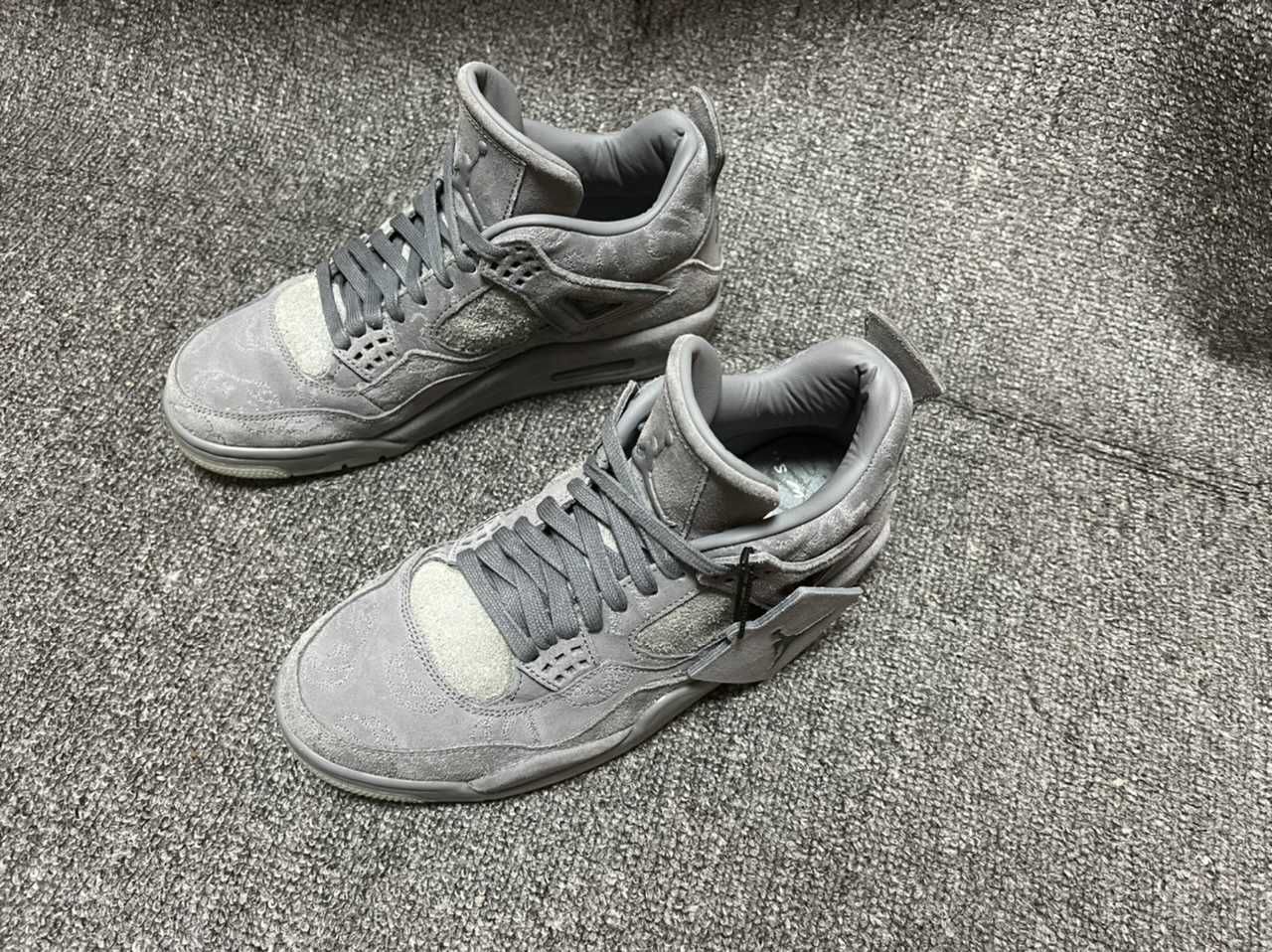 KAWS × Nike Air Jordan 4 Retro "Grey"