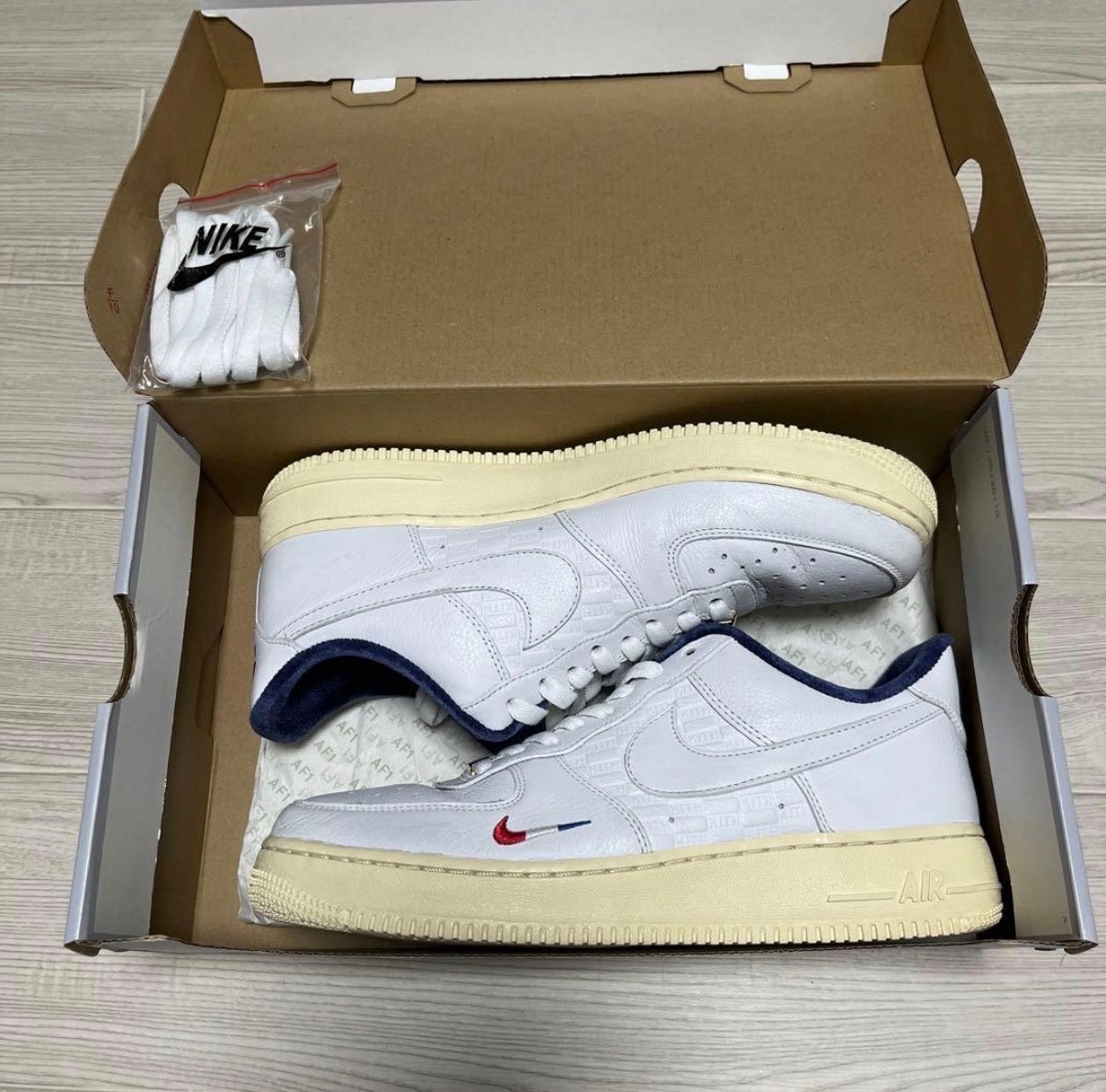 Kith × Nike Air Force 1 Low "France"