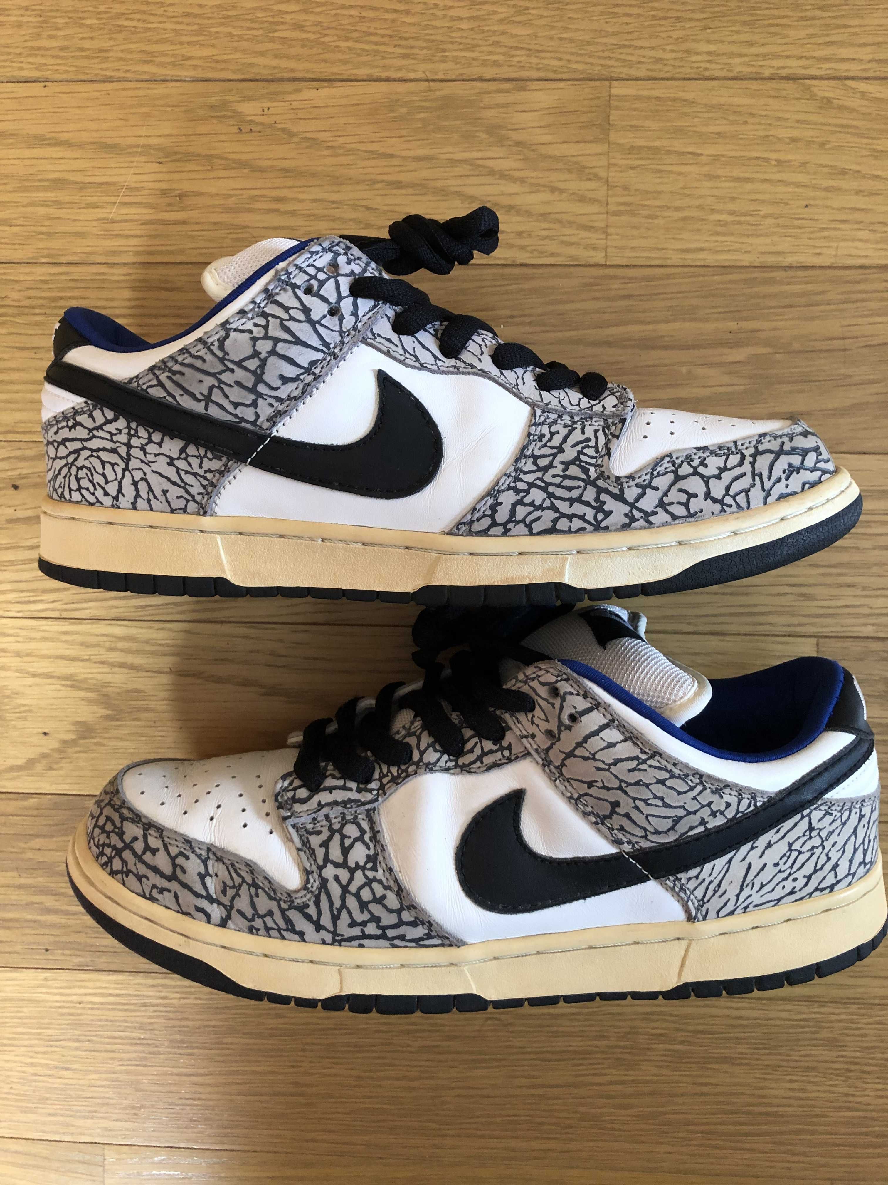 Supreme × Nike SB Dunk Low "White Cement/Safari" (2002)