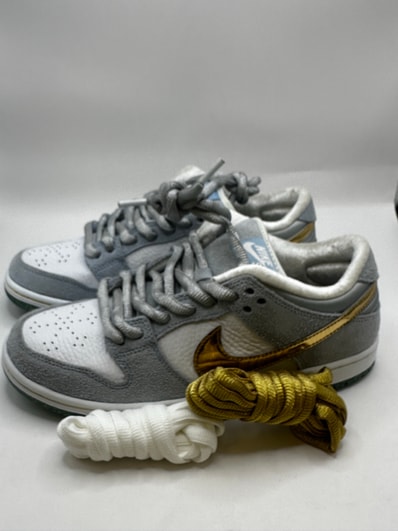 Sean Cliver × Nike SB Dunk Low "Holiday Special"