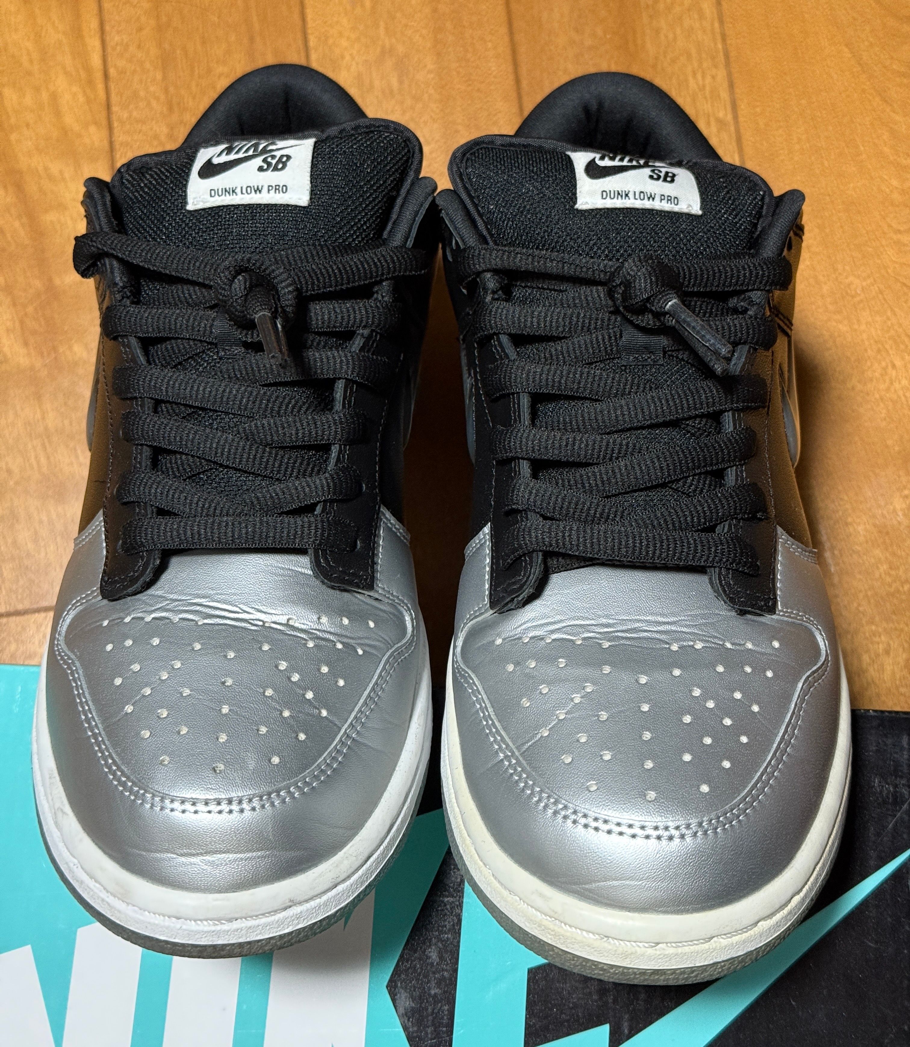 Supreme × Nike Dunk Low "Metallic Silver/Black"