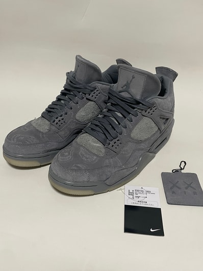 KAWS × Nike Air Jordan 4 Retro "Grey"