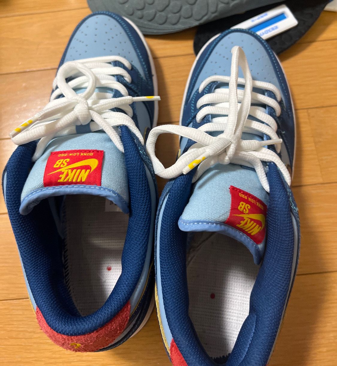 Why So Sad? × Nike SB Dunk Low "Coastal Blue/Speed Yellow-University Red"